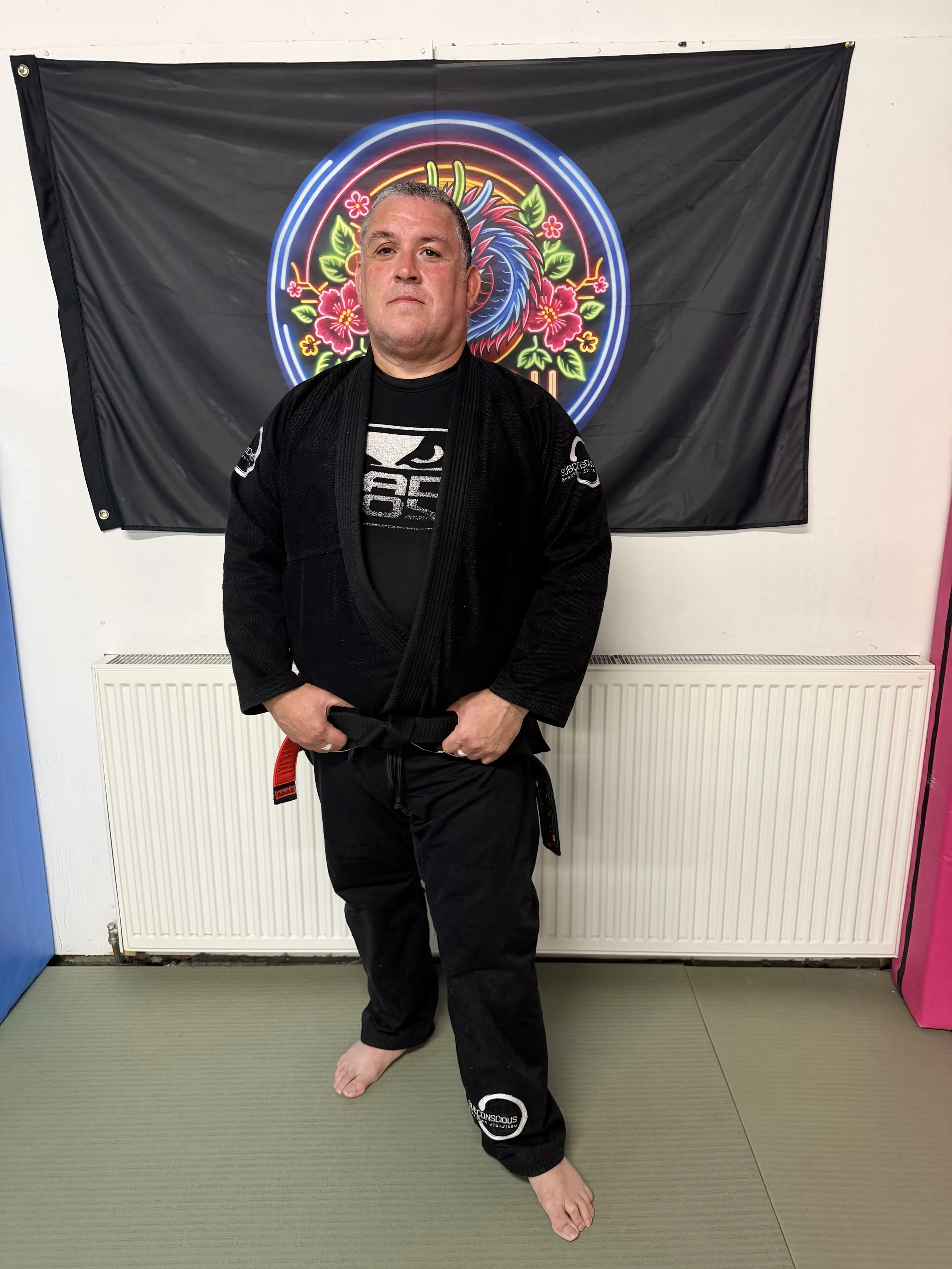 Damien Dawson. Black Belt Under Nic Gregoriades and Brent Burniston. 
