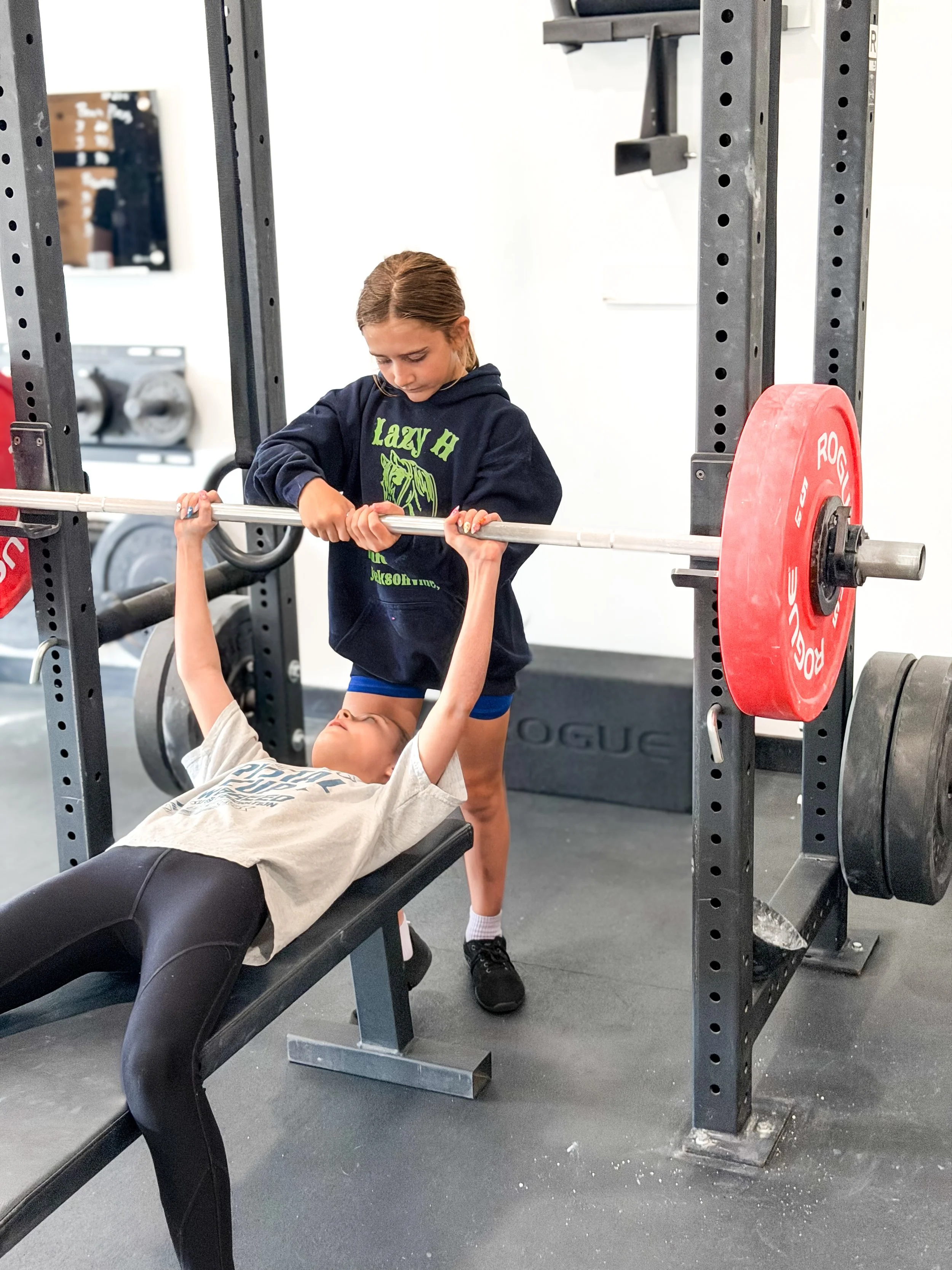 girls strength training class surf city nc learning proper lifting technique