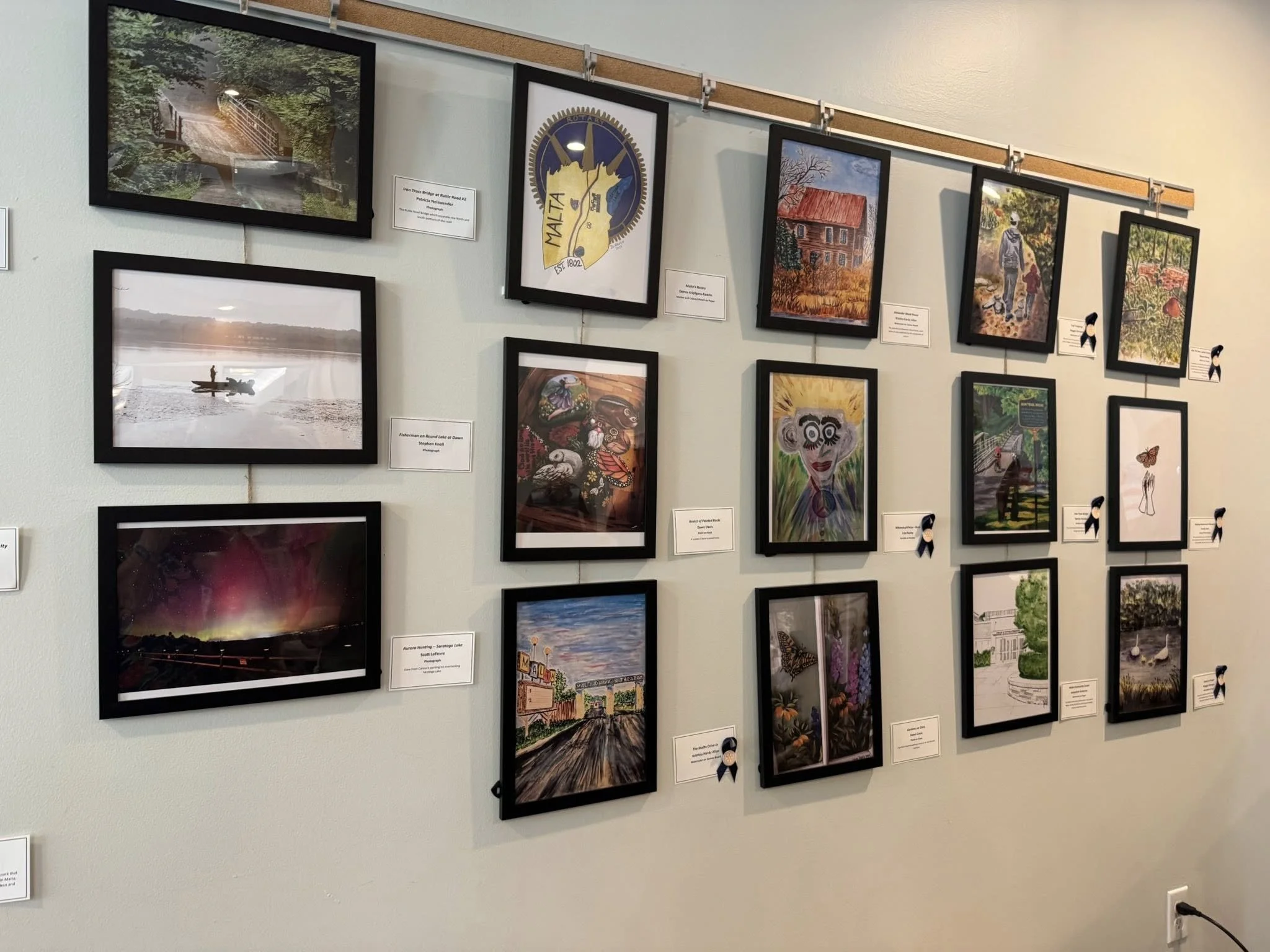 A display of all 33 submissions at the Malta Community Center