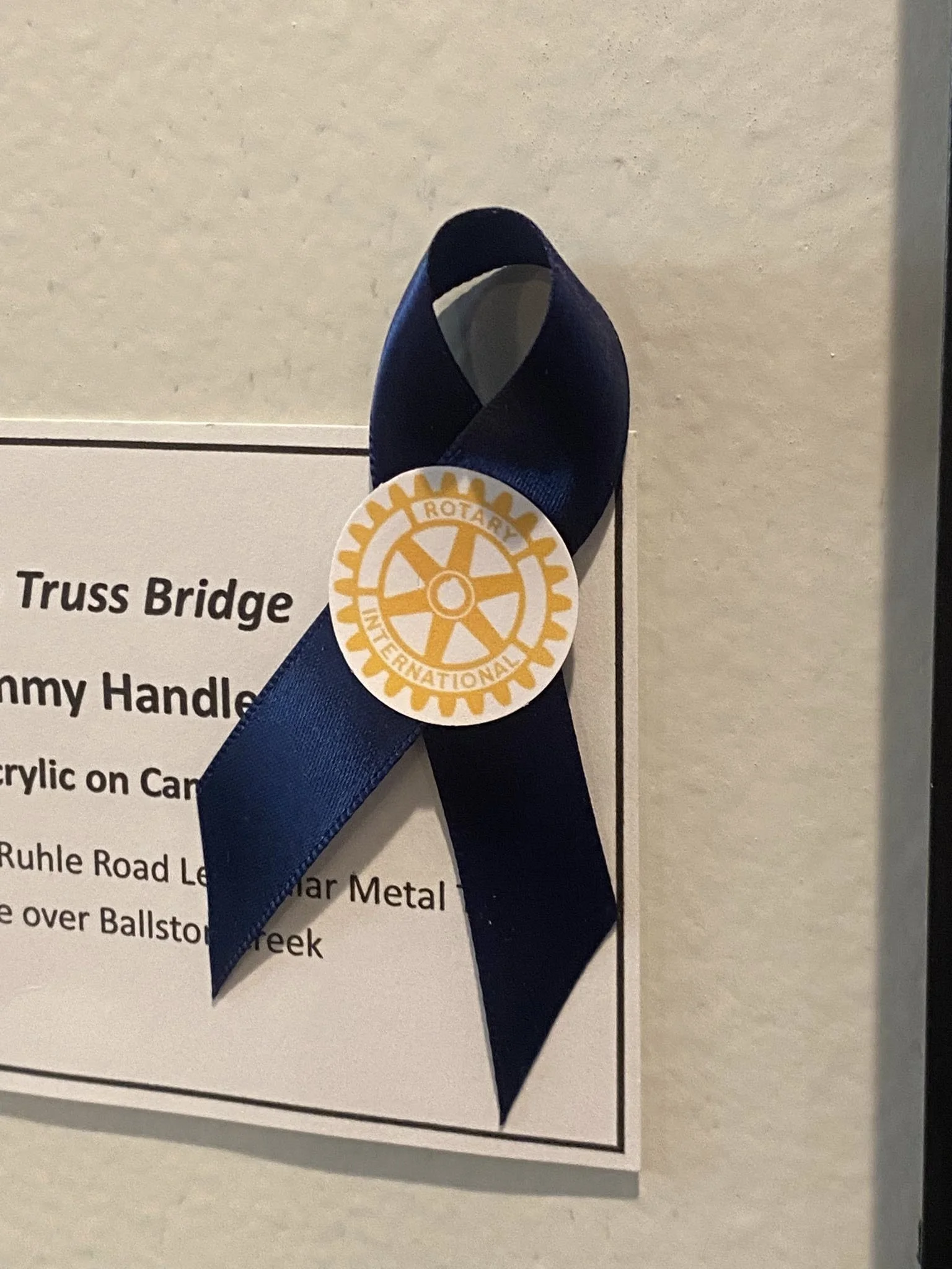 The selected artwork was tagged with a ribbon at the ceremony