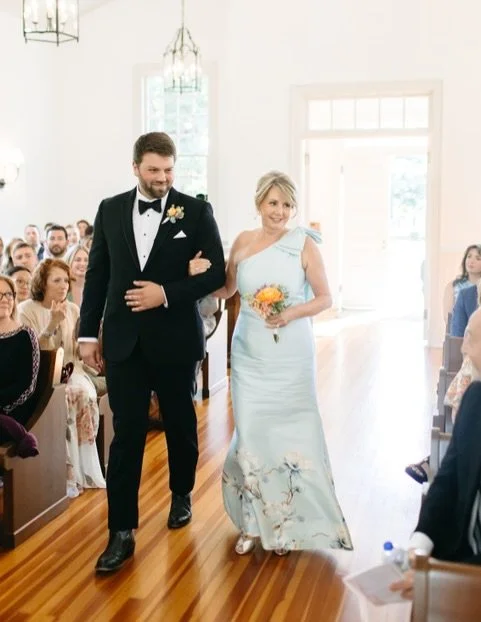 Part of the Calabro Collection, &lsquo;Wildflower Wonder&rsquo; is a bespoke one-shoulder couture gown crafted in powder-blue silk, adorned with a custom vine-and-blossom motif and tailored in New York for a flawless fit! Visit our website, gramercy-