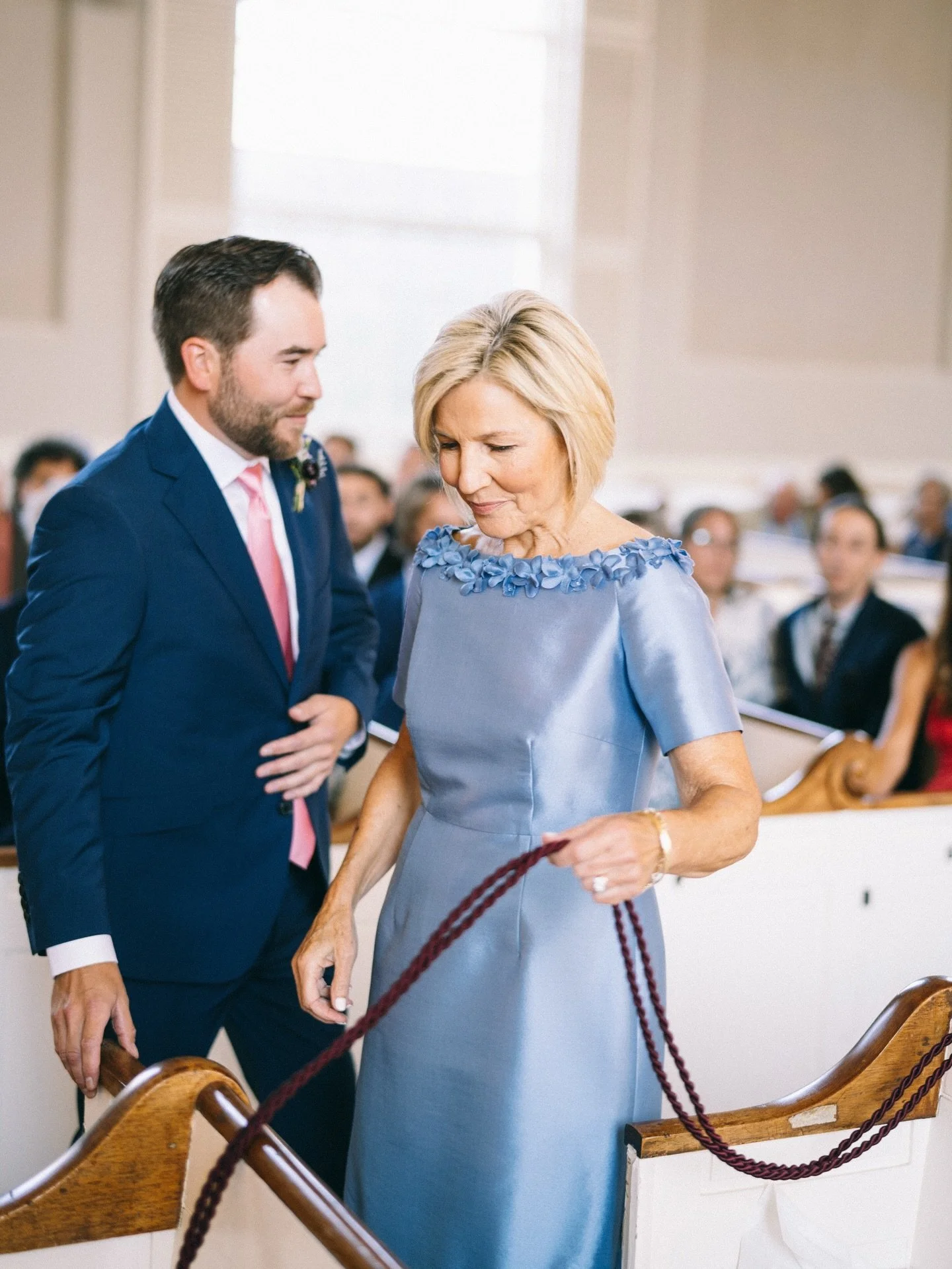 Powder blue, reimagined. This silhouette blends classic femininity with modern structure &mdash; a sculpted bodice, delicate neckline detail, and fluid movement that carries seamlessly from ceremony to celebration. Designed for comfort, photographed 