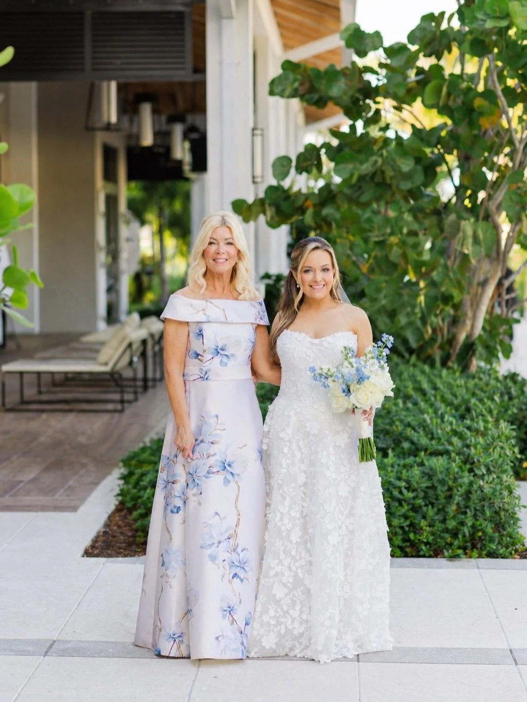 The Wildflower Wonder Diana Dress is a bespoke silk jacquard gown designed with a soft column silhouette that skims the body before flowing into effortless movement. Featuring a graceful open neckline and delicate sleeves, every detail is intentional