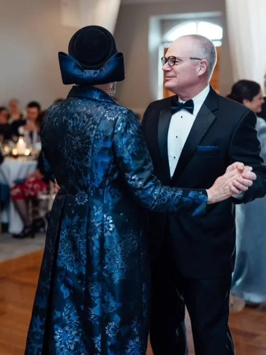 A moment made to move beautifully from aisle to dance floor. Draped in a custom gown with a matching overcoat, our client embodied timeless elegance with every step, every turn, every unforgettable moment of the evening. At Gramercy Atelier, we creat