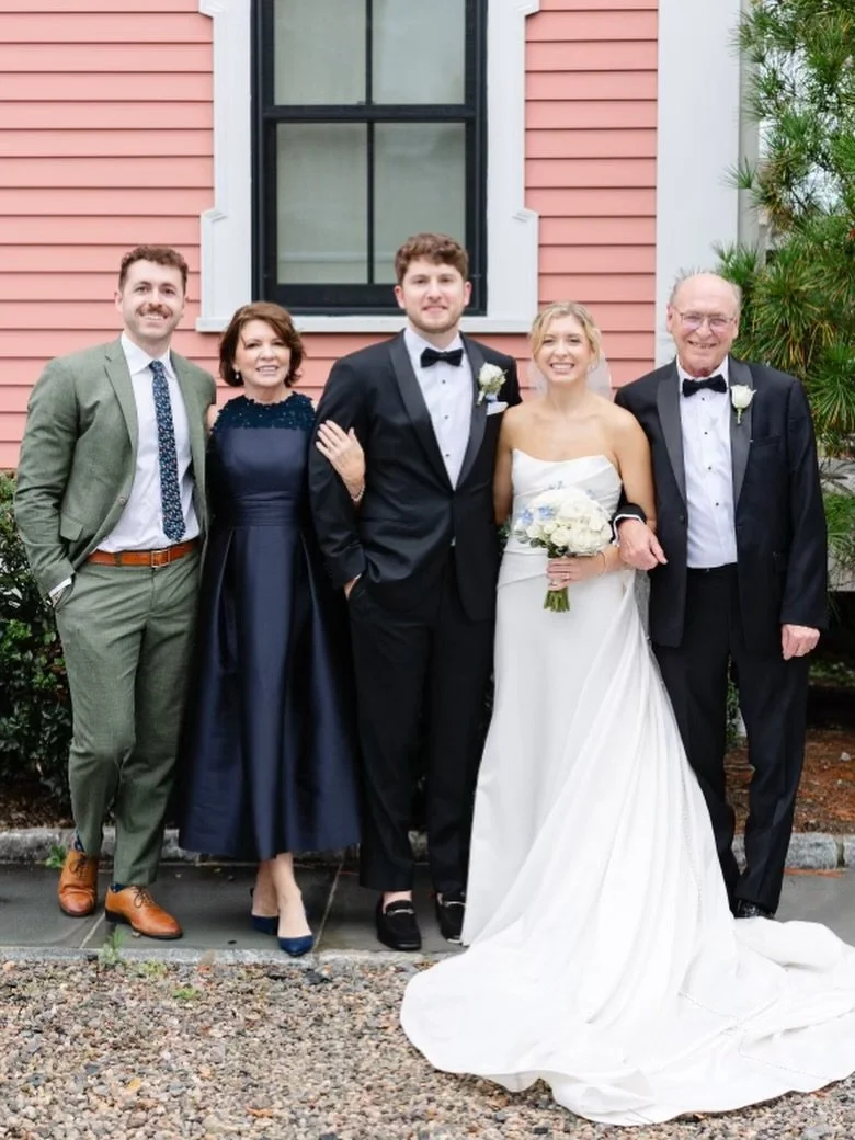 Navy remains one of the most timeless choices for a mother of the bride gown, refined, effortless, and elegant in every setting. Whether worn in a candlelit ballroom or against an oceanside backdrop, a deep navy tone brings a sense of confidence and 
