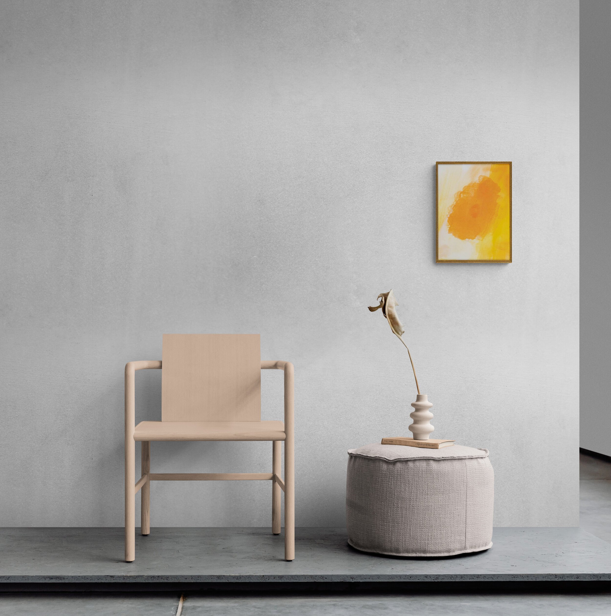 Chair_and_pouf_sitting_on_concrete_slab+%281%29.jpg