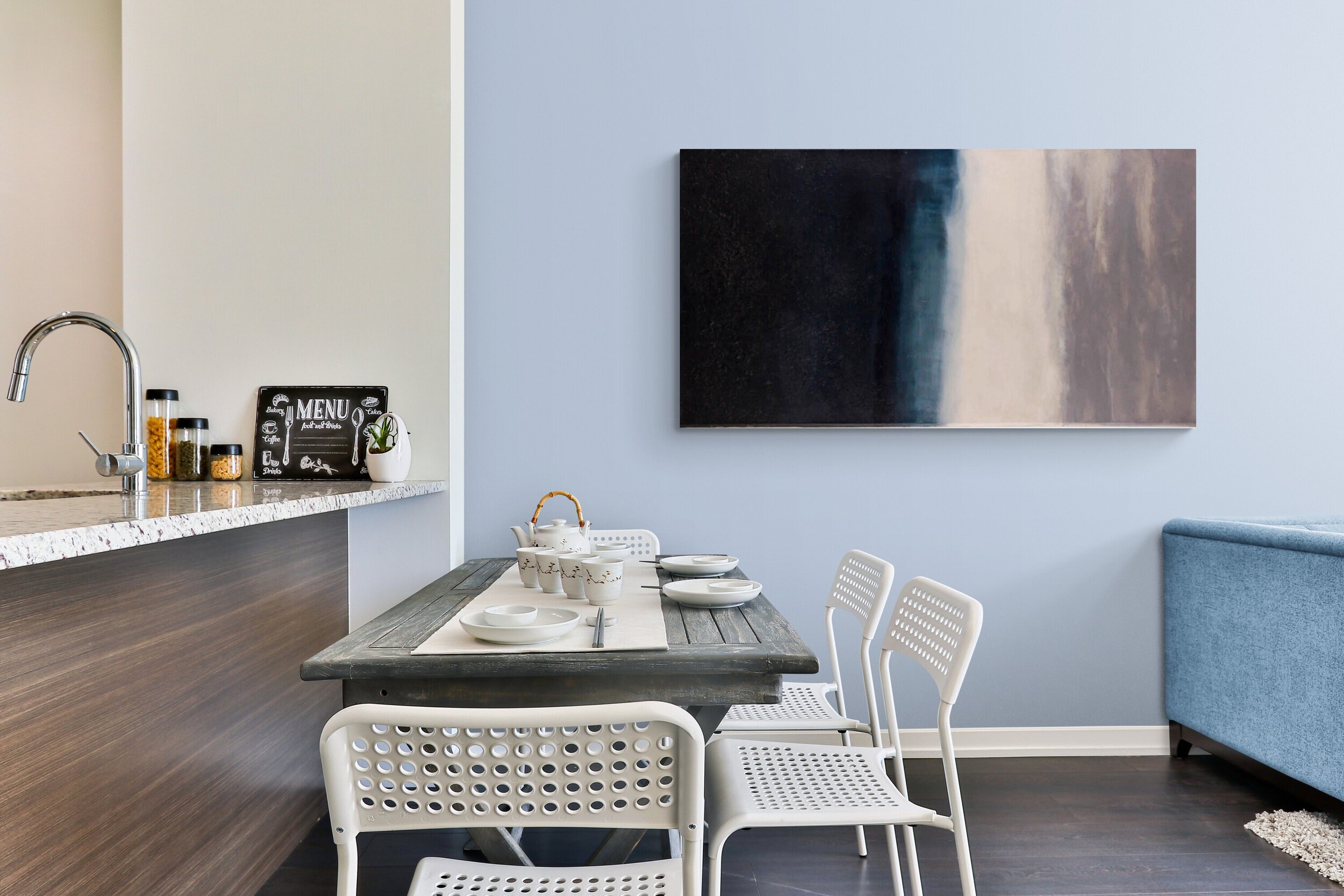 Dining_area_with_large_wooden_table.jpg