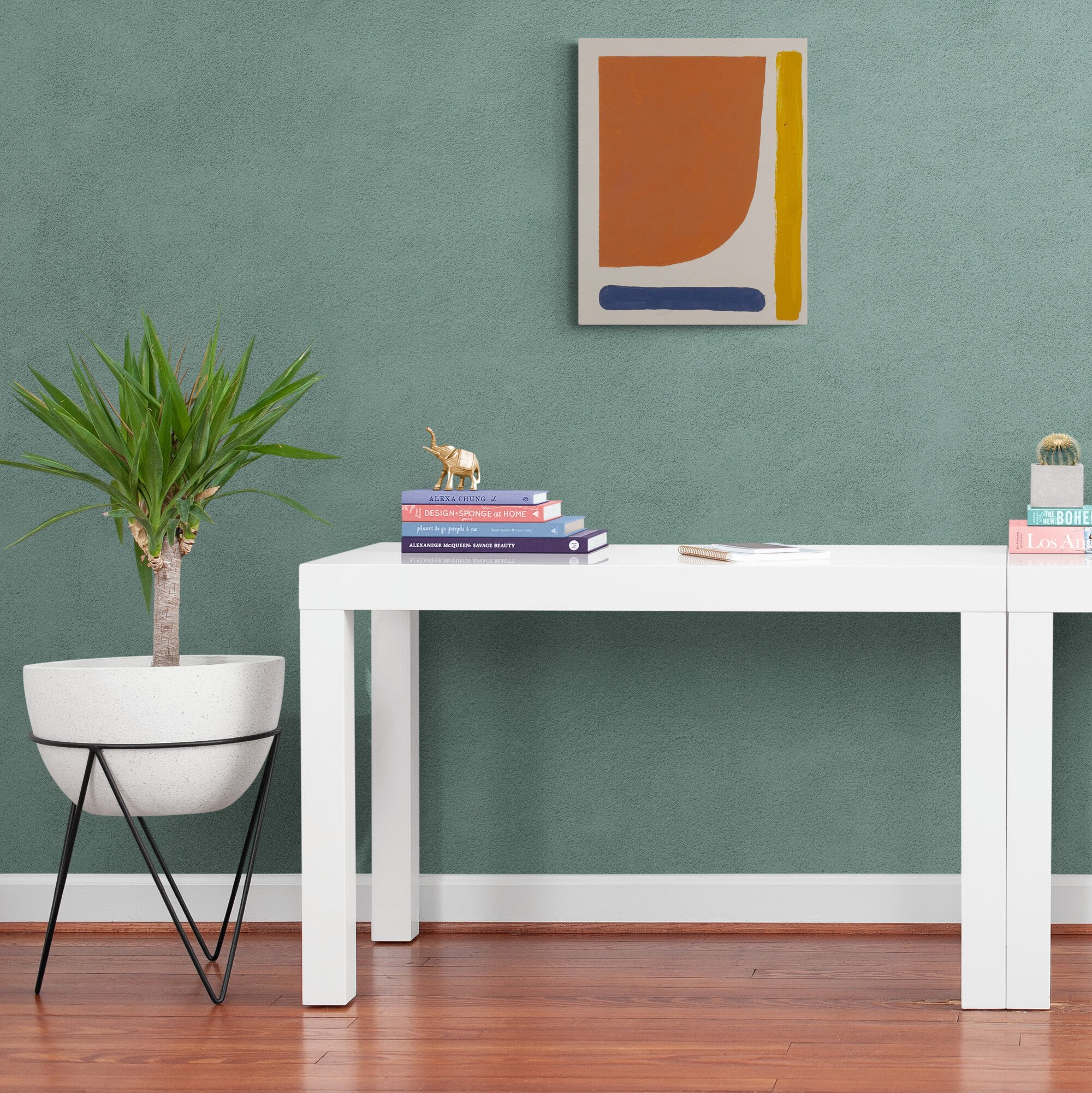 Hallway_with_white_tables_and_plants.jpg
