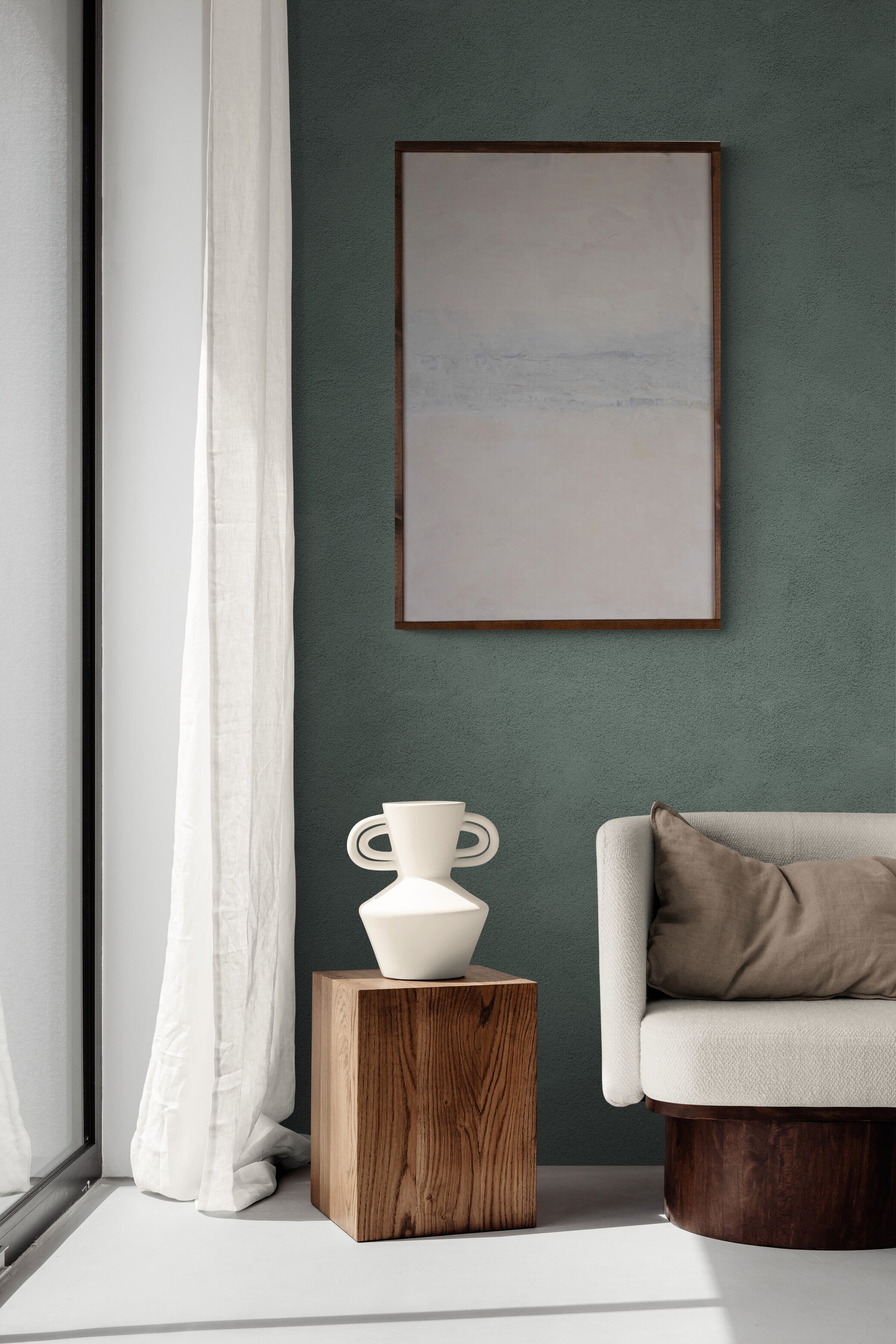 Trendy_vase_and_armchair_next_to_window.jpg