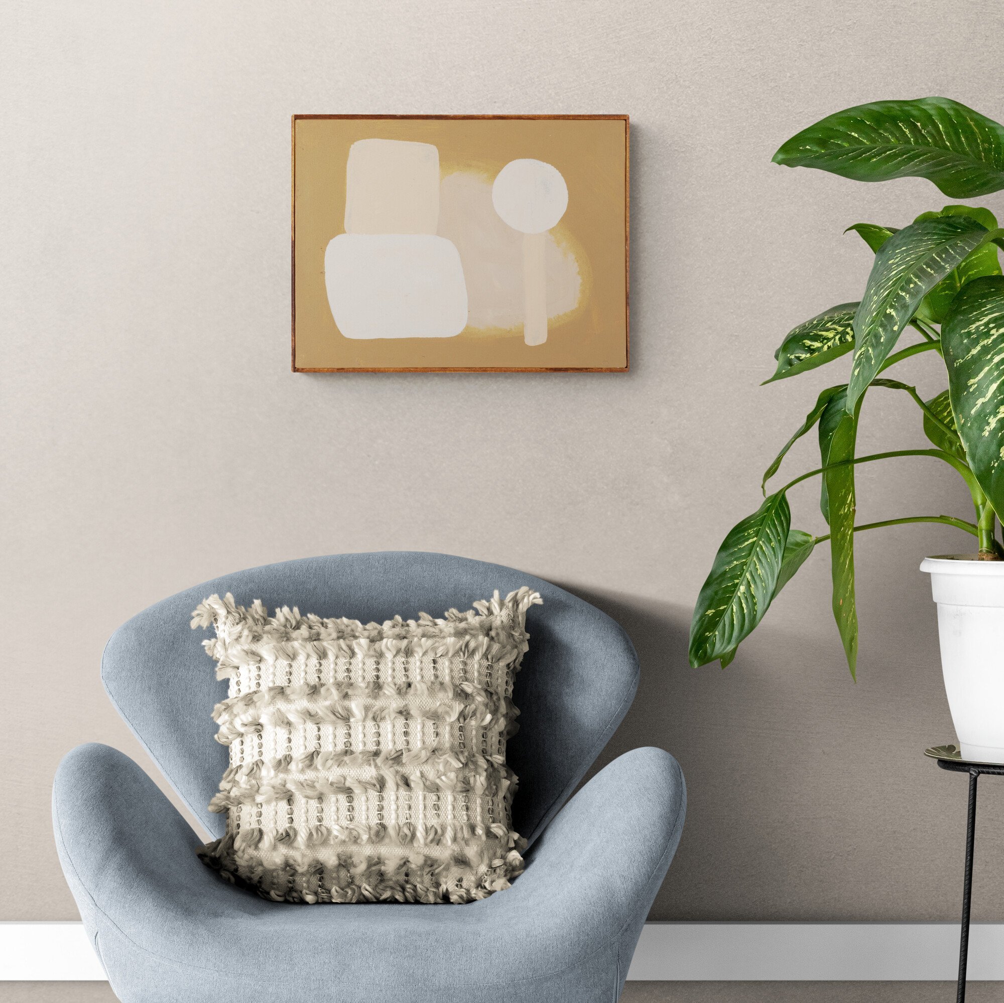 Comfy_armchair_and_tropical_plant.jpg