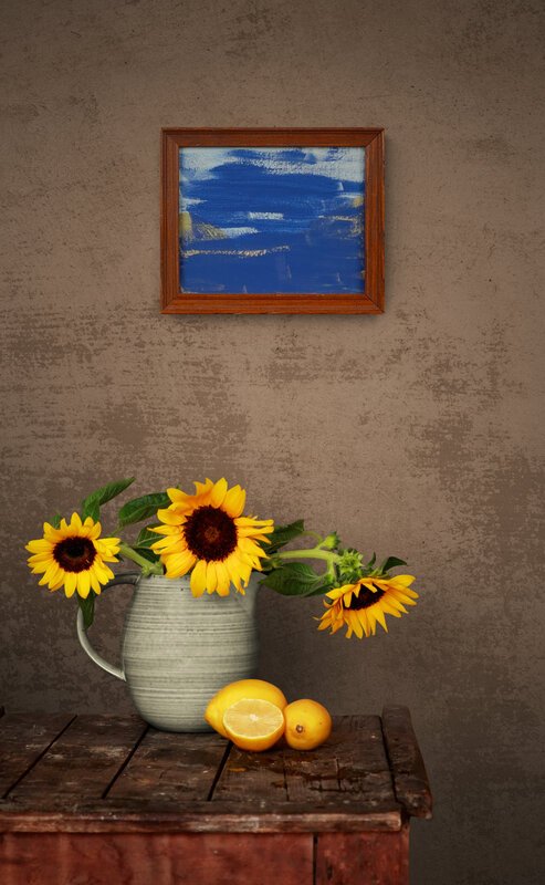 rustic-bench-with-sunflowers-in-jug.jpg