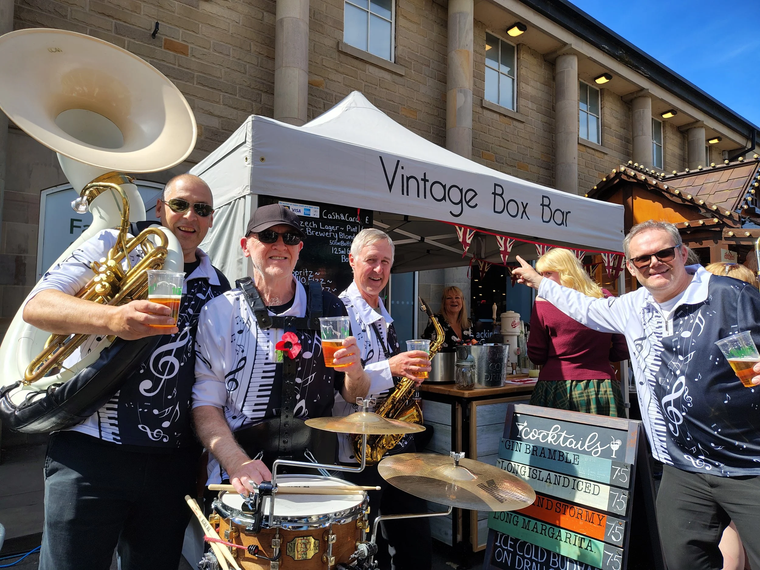 Roaming acoustic Jazz band performing at Bakewell food and drink festival in Derbyshire UK