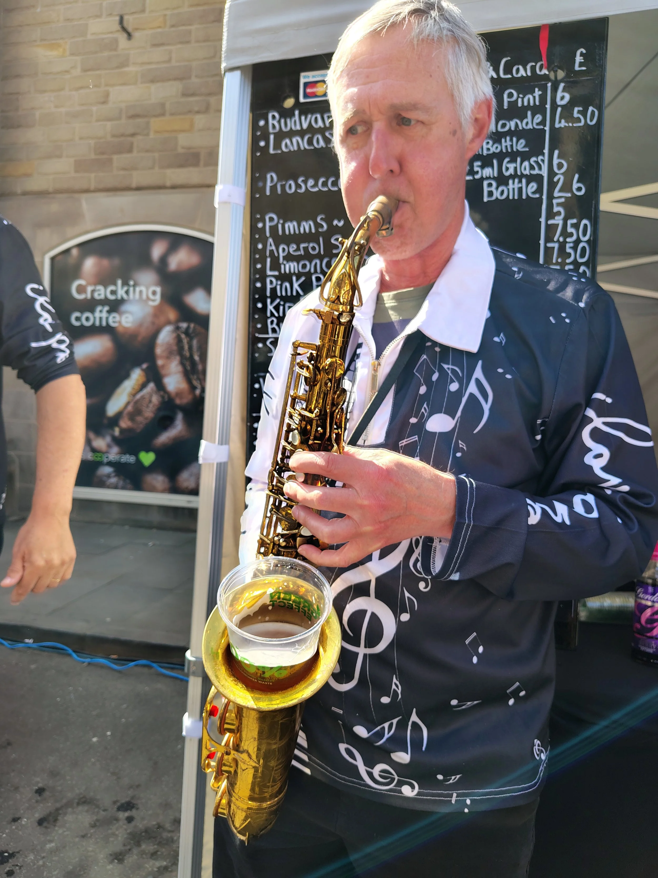 Roaming Jazz band with Saxophone performing at Bakewell food festival in Derbyshire, United Kingdom