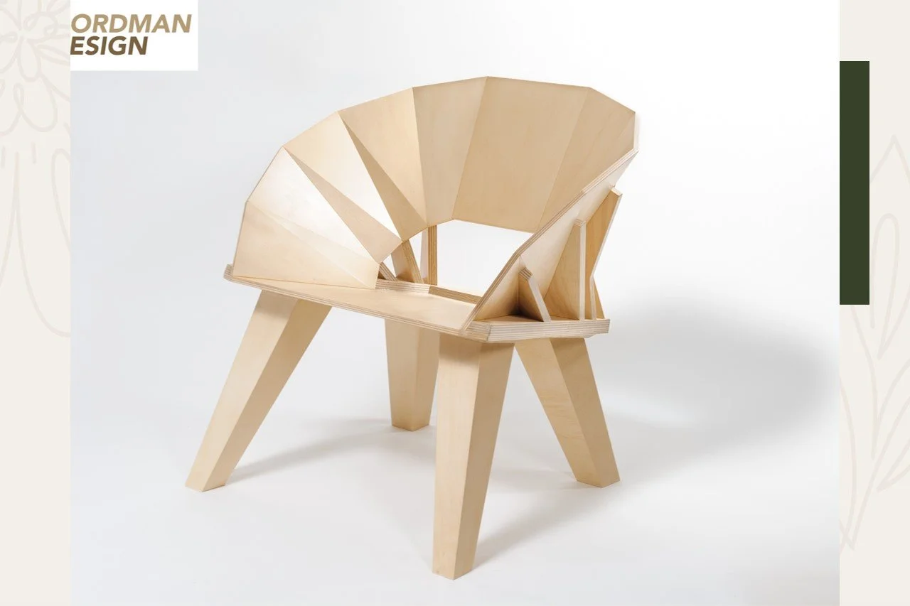 A wooden chair with a modern, geometric design featuring a folded, angular backrest and four angled legs, set against a plain white background.