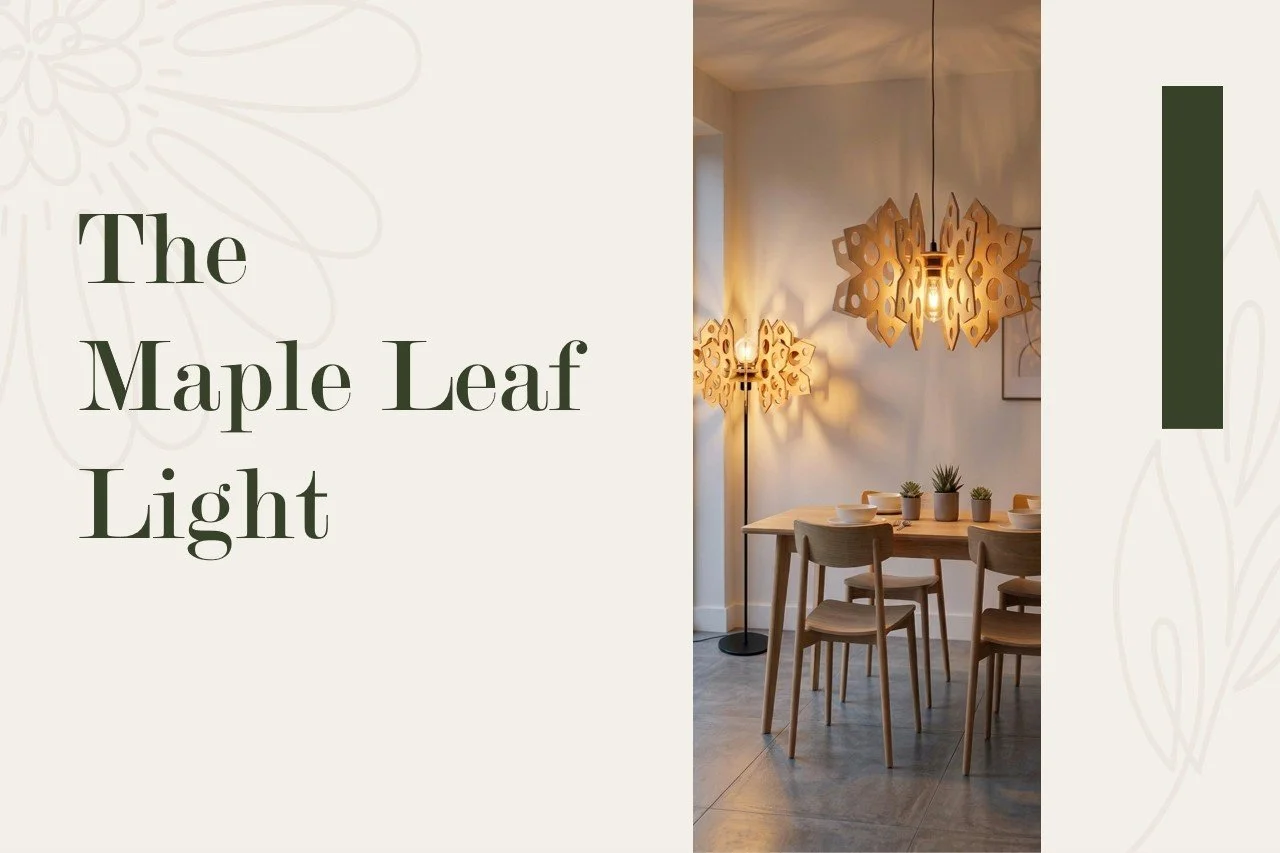 Living room with two maple leaf-shaped pendant lights hanging above a dining table with four chairs and small potted plants, lit with warm lighting.