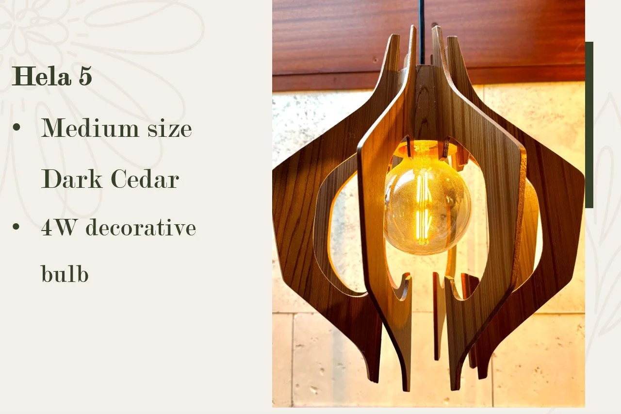 A modern wooden pendant light fixture with a brass-colored decorative bulb, made of dark cedar wood with medium size.