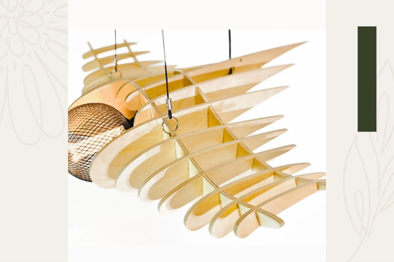 A modern pendant light fixture made of layered wooden fins and a spherical woven rattan lampshade.
