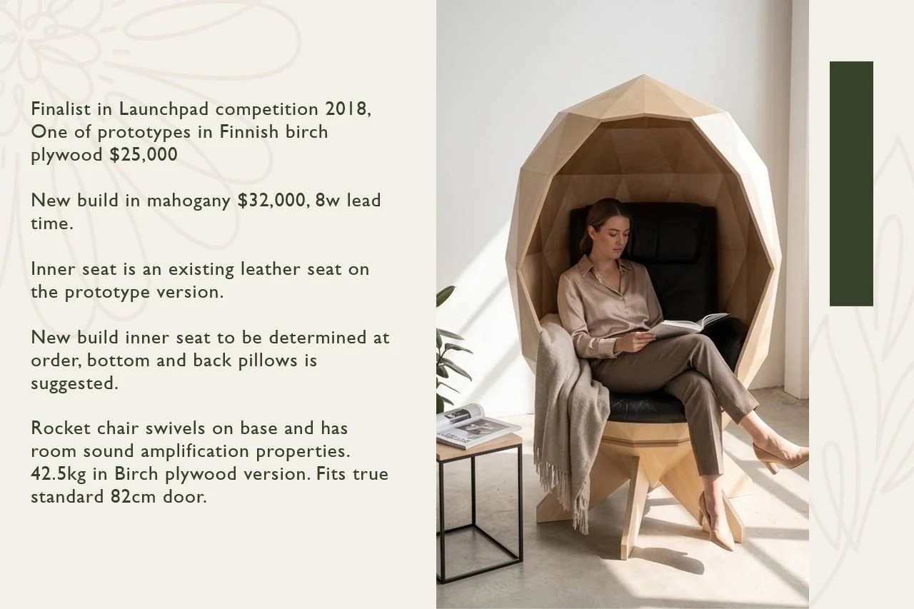 A woman sitting inside a wooden hexagonal pod chair reading a book, with a plant and a small table nearby.
