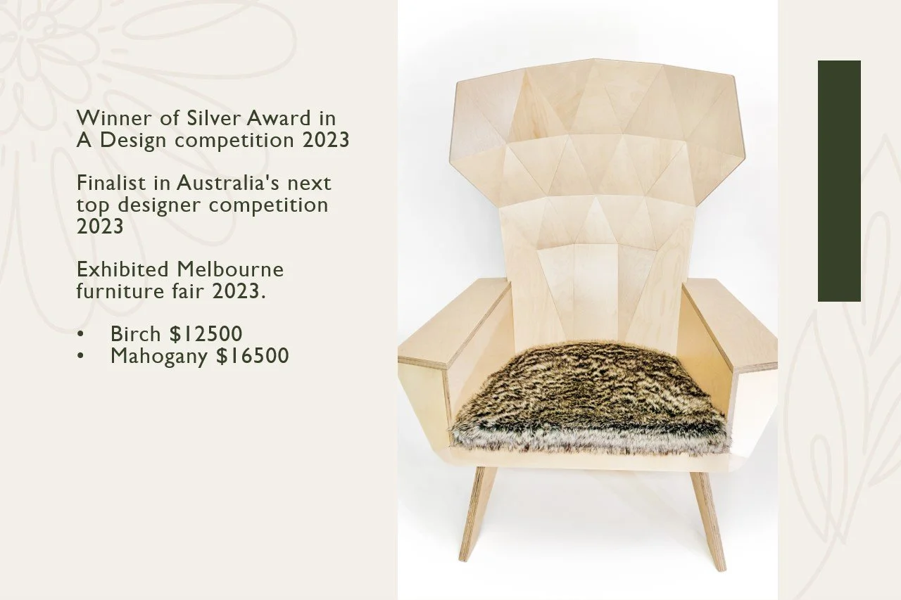 A wooden armchair with a high back and wide armrests, featuring a furry cushion on the seat, placed against a plain background.