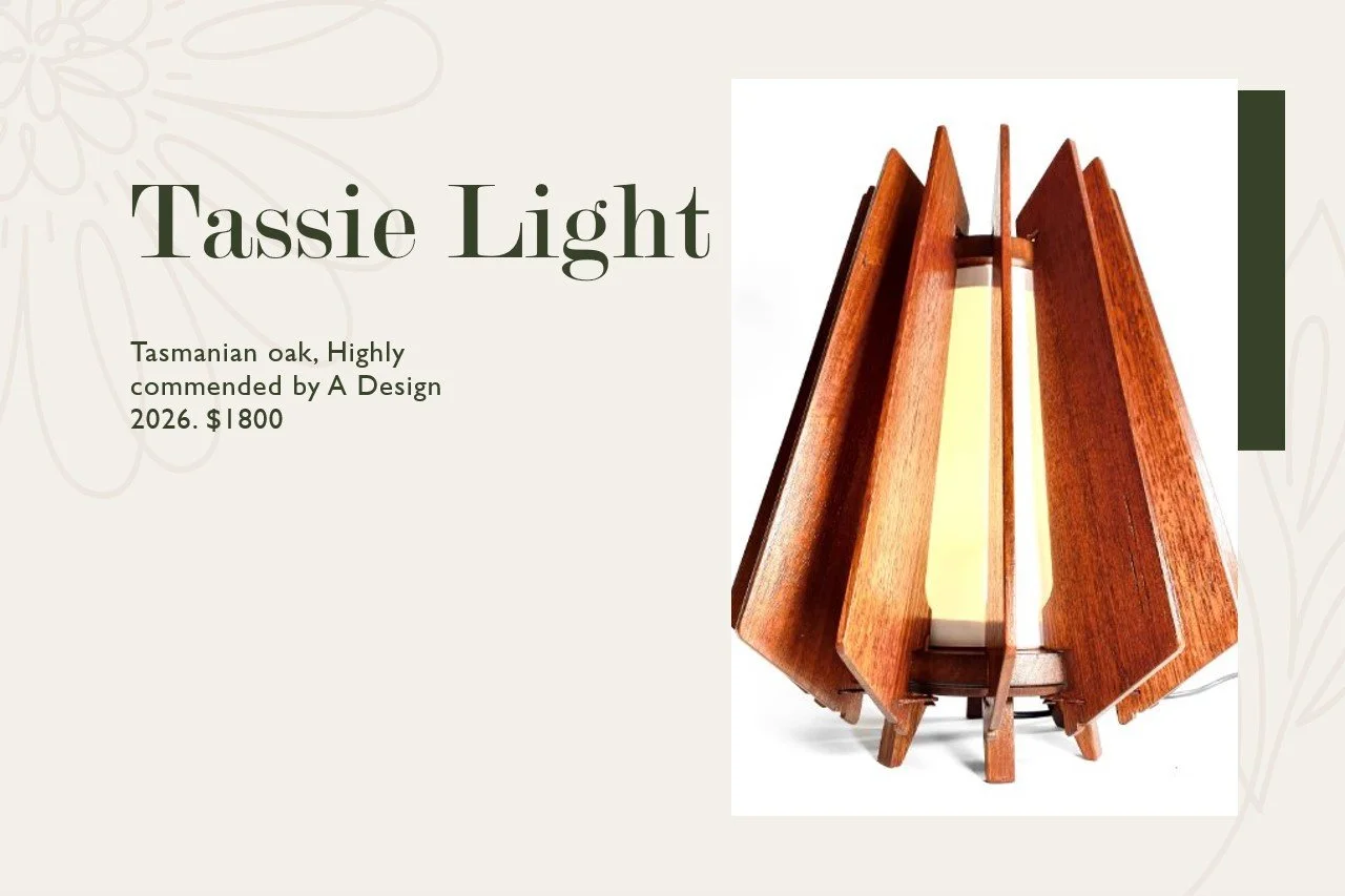A modern wooden lamp with angled plywood panels, called Tassa Light, made from Tasmanian oak.