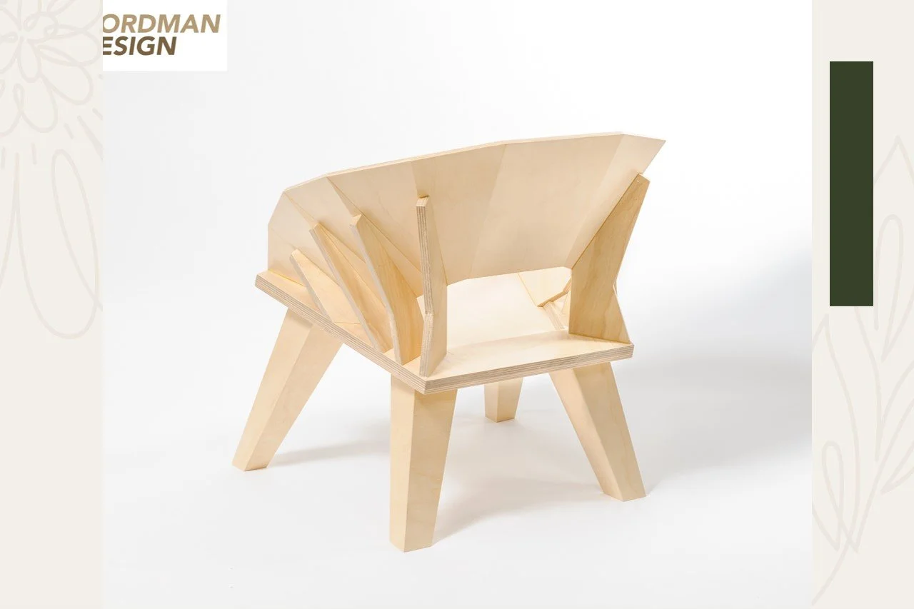 A wooden chair with a backrest made of angled wooden slats and four sturdy legs, designed with a modern, geometric aesthetic.