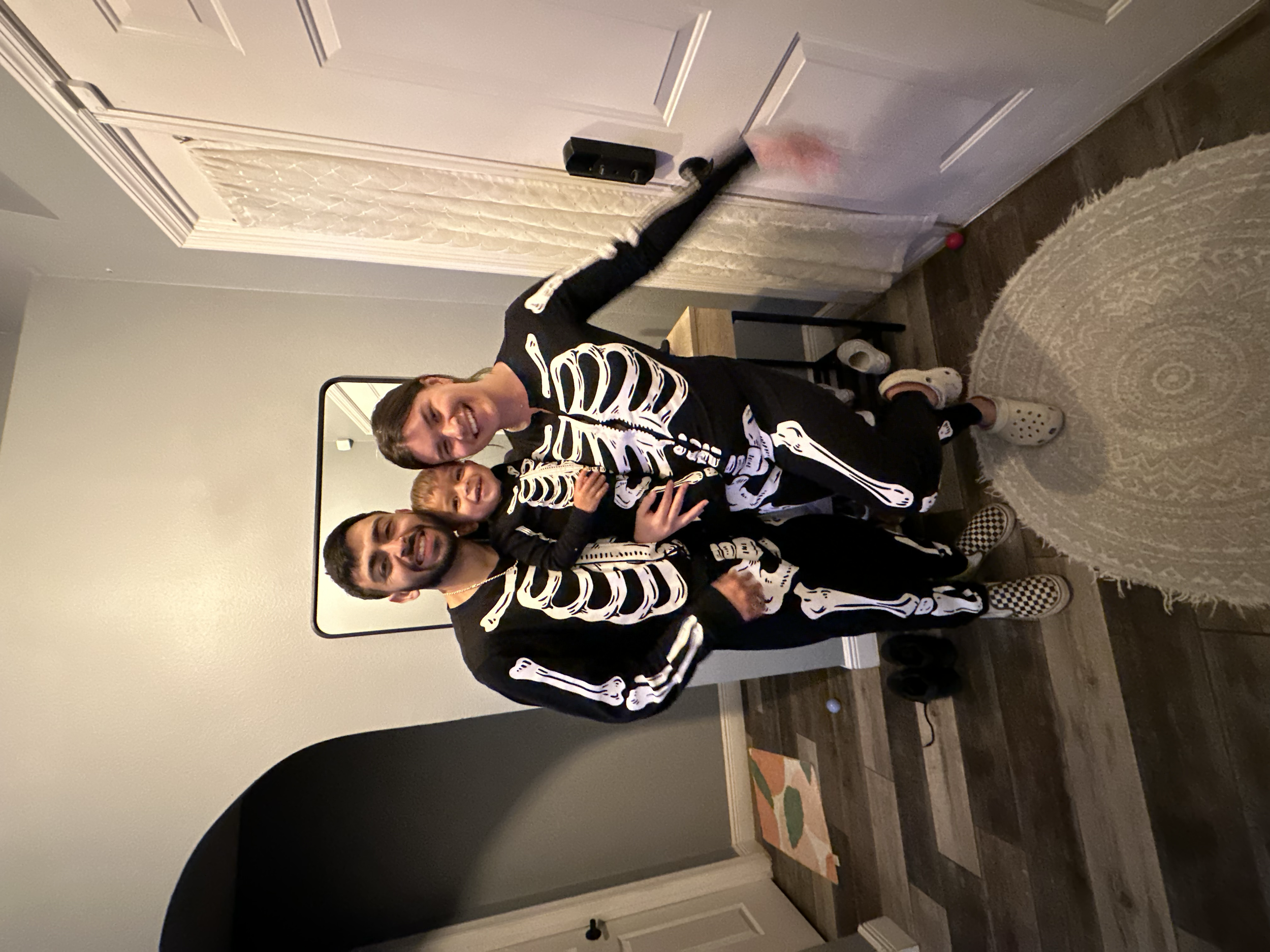Halloween night as a family of skeletons
