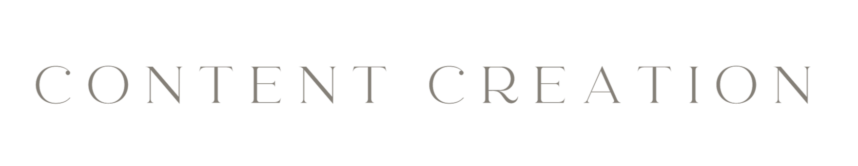 The image features the phrase 'CONTENT CREATION' in large, elegant, gray letters displayed on a black background.