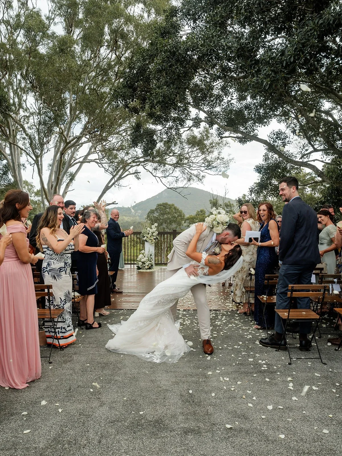 Bridesmaids walking down the aisle with hinterland scenery in the background — Sean Reefman Photography