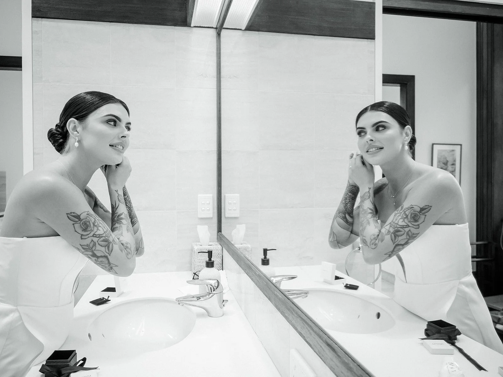 Cherry the bride getting ready reflected in bathroom mirror black and white — Jimbour House wedding by Sean Reefman Photography
