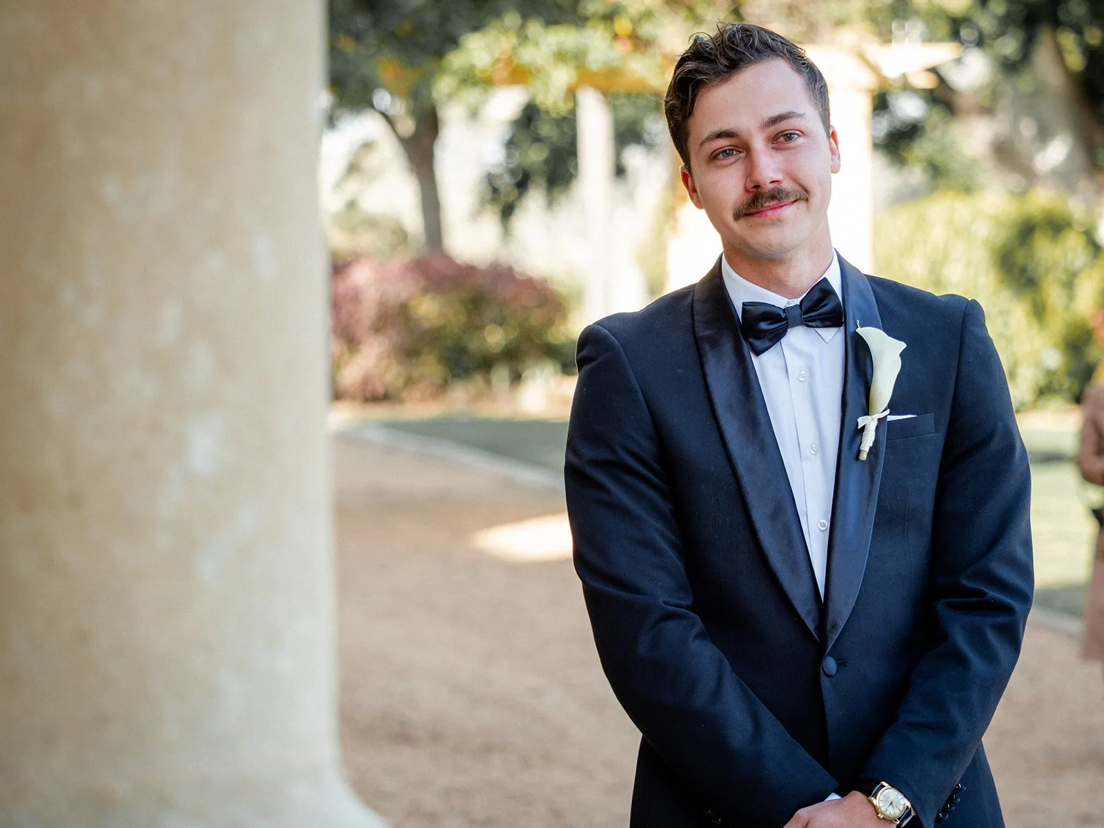 Nick the groom waiting at the ceremony with emotional expression — Jimbour House wedding by Sean Reefman Photography