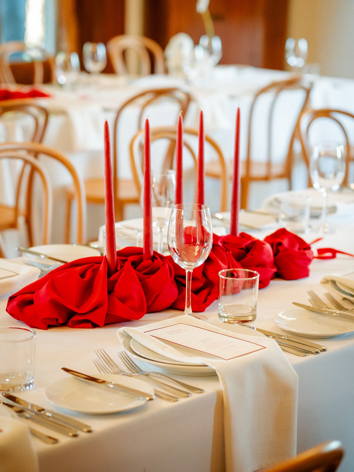 Red candles and red linen table detail at Cherry and Nick's Jimbour House reception — Sean Reefman Photography