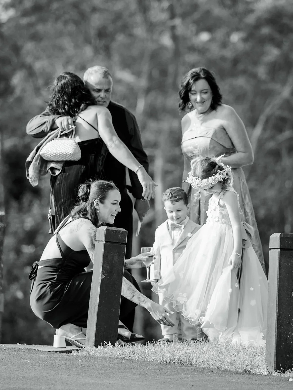 Chloe's father helping fix her veil before the ceremony in black and white — Sean Reefman Photography
