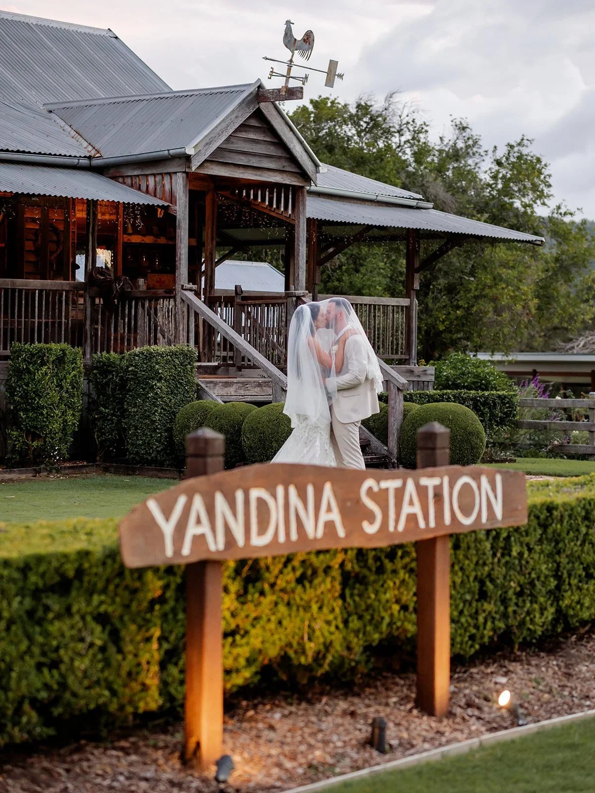 Yandina Station signage lit up in the evening light — Sean Reefman Photography