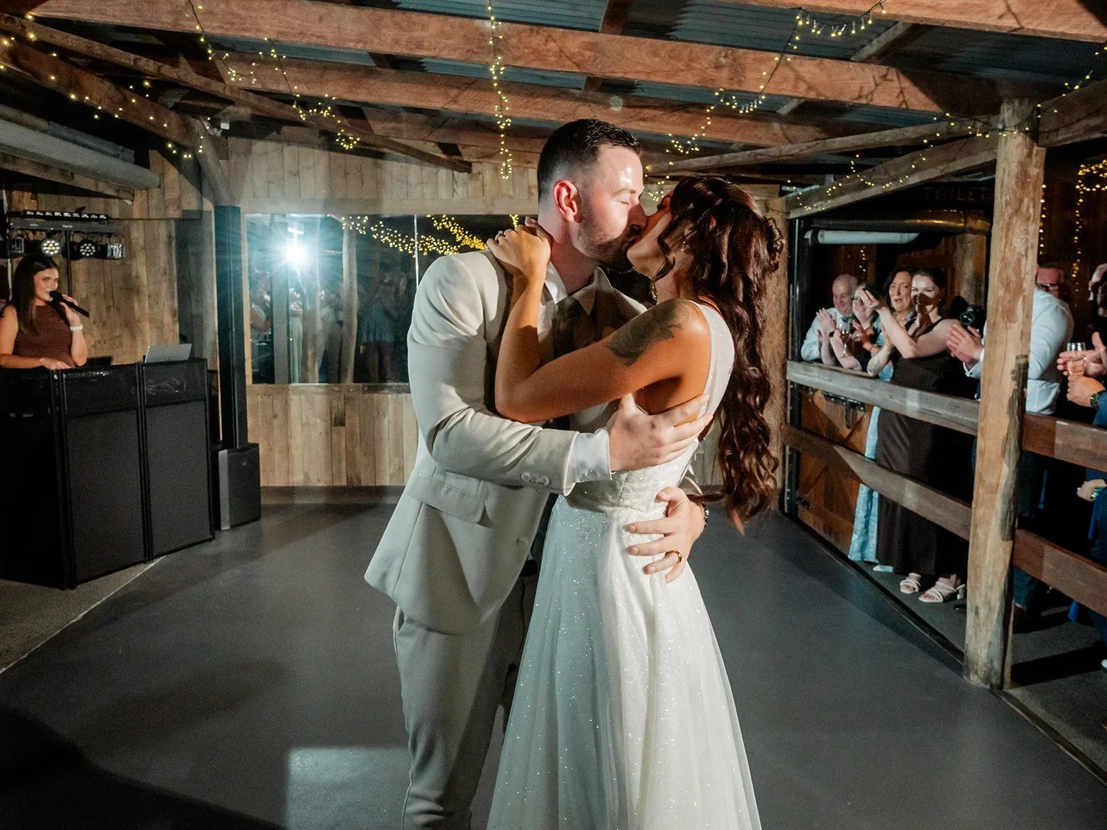 Chloe and James in a close embrace during their first dance — Sean Reefman Photography