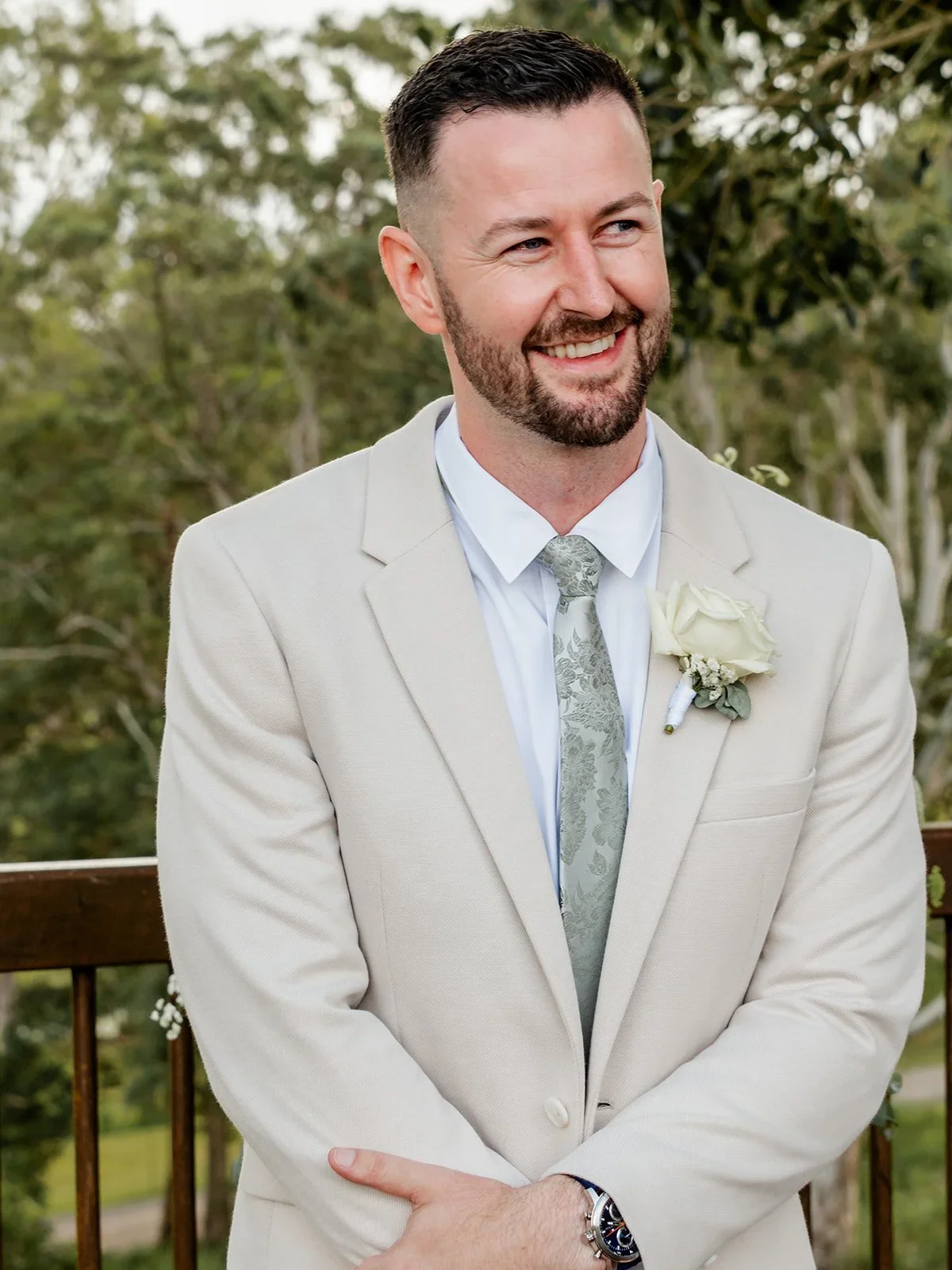 James smiling in his tan suit ahead of the ceremony — Sean Reefman Photography
