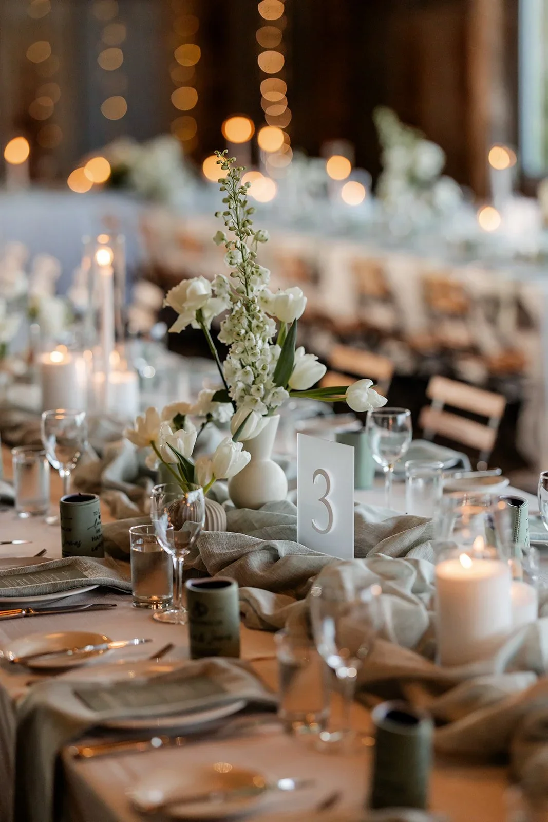Candlelit table setting detail at the Yandina Station reception — Sean Reefman Photography