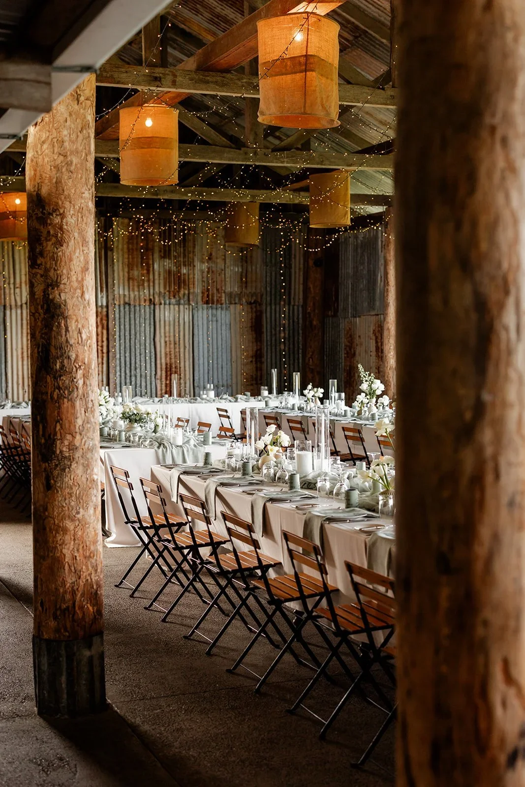 Wide shot of the Yandina Station reception barn dressed with lanterns and festoon lighting — Sean Reefman Photography