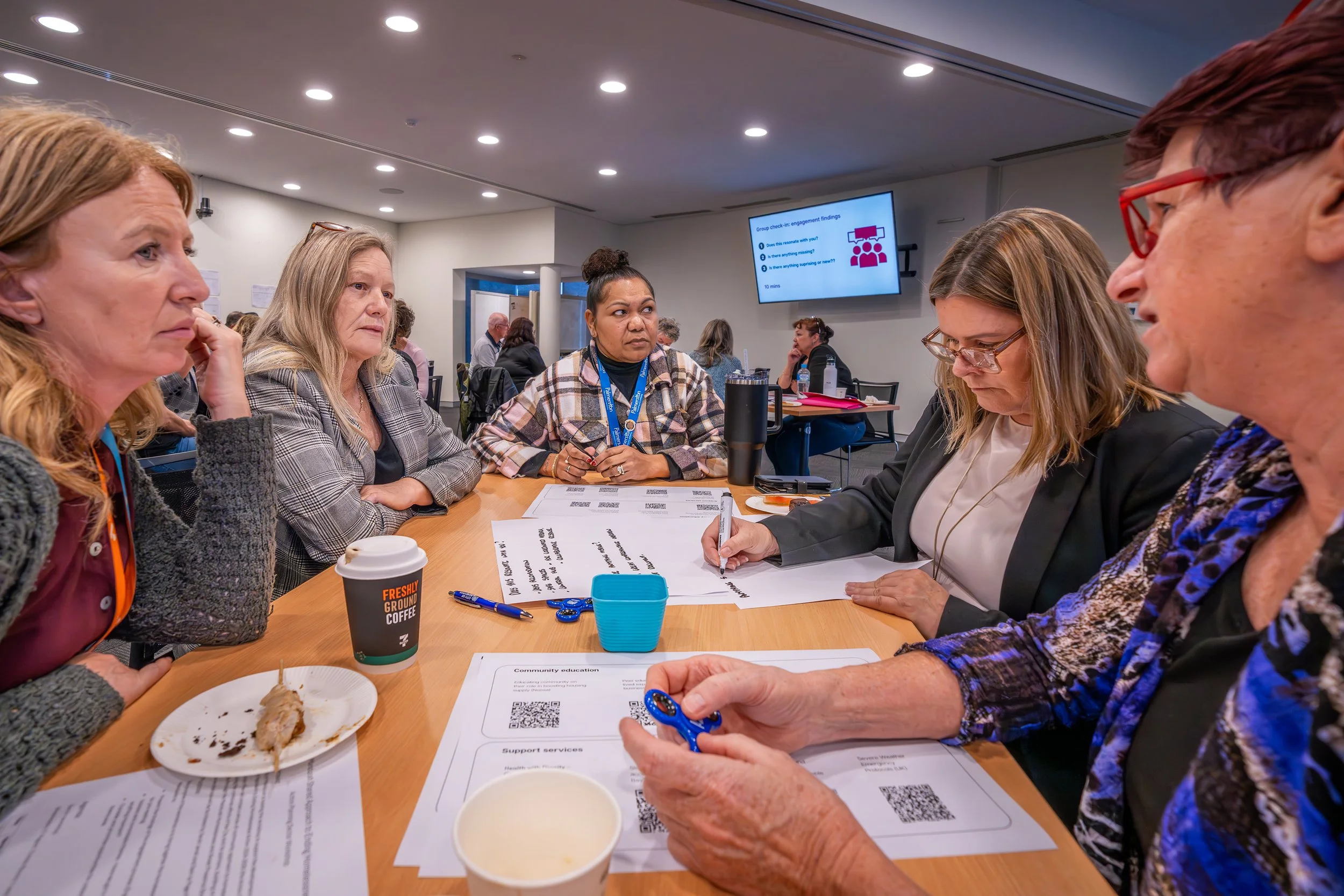 group of people working at table