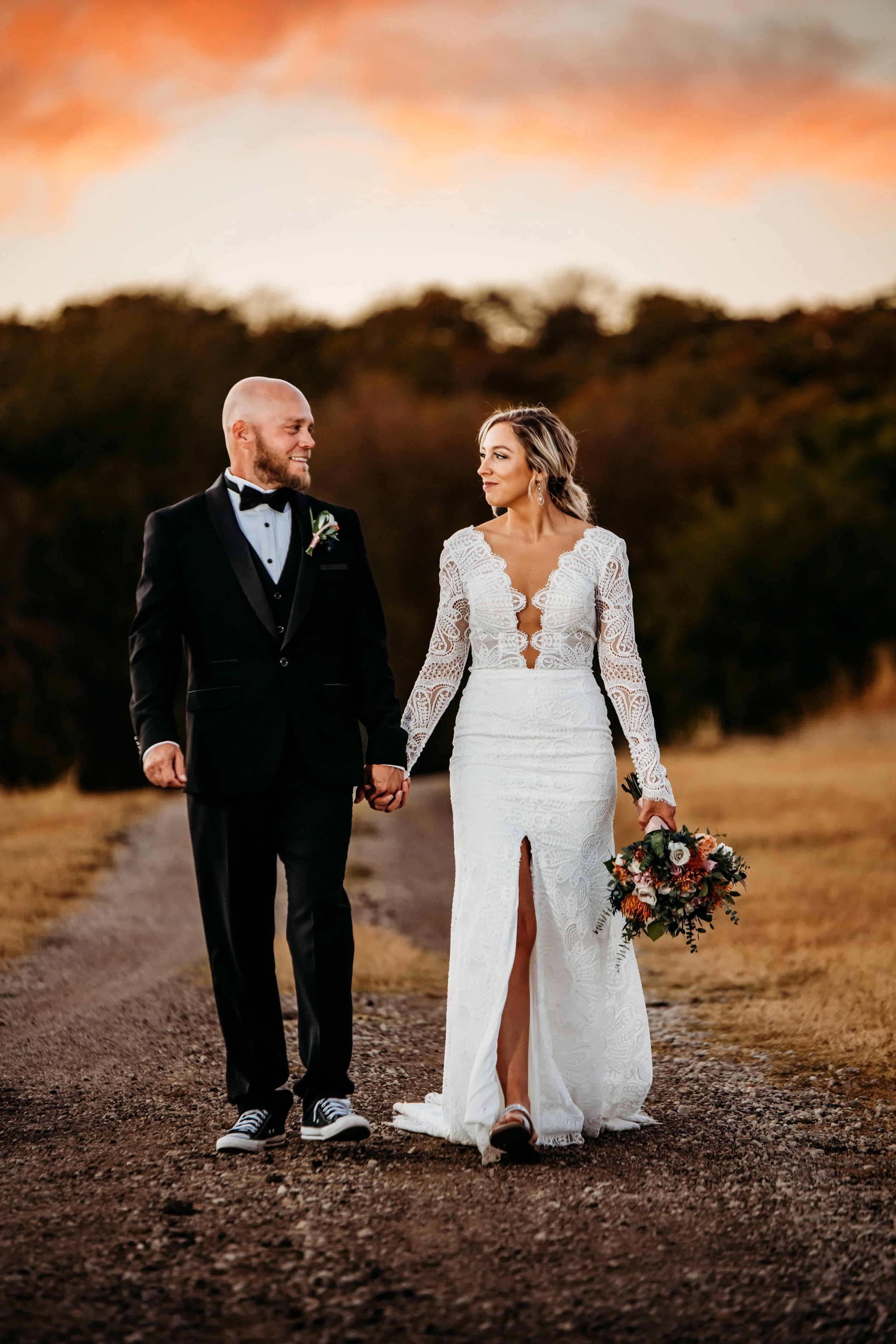 Tulsa wedding photographer couple walking during sunset