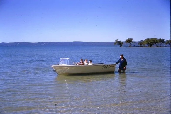 kids-in-boat-morwong-beach.jpg