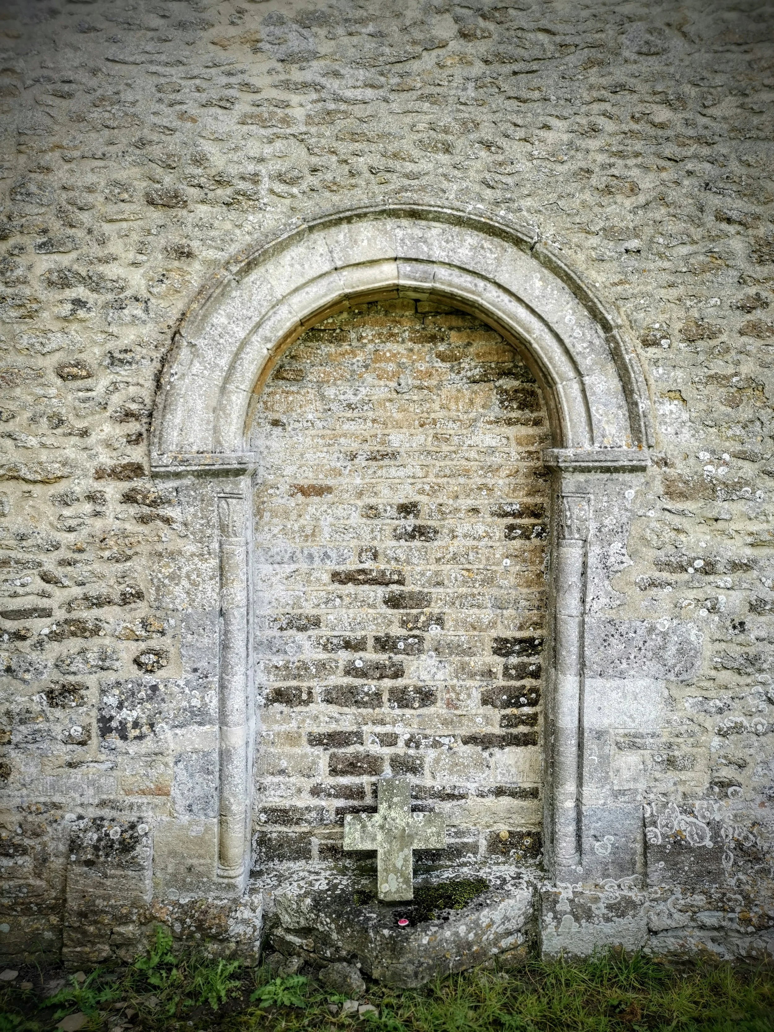 A blocked doorway or ghost door in the All Saints Church at Shorncote