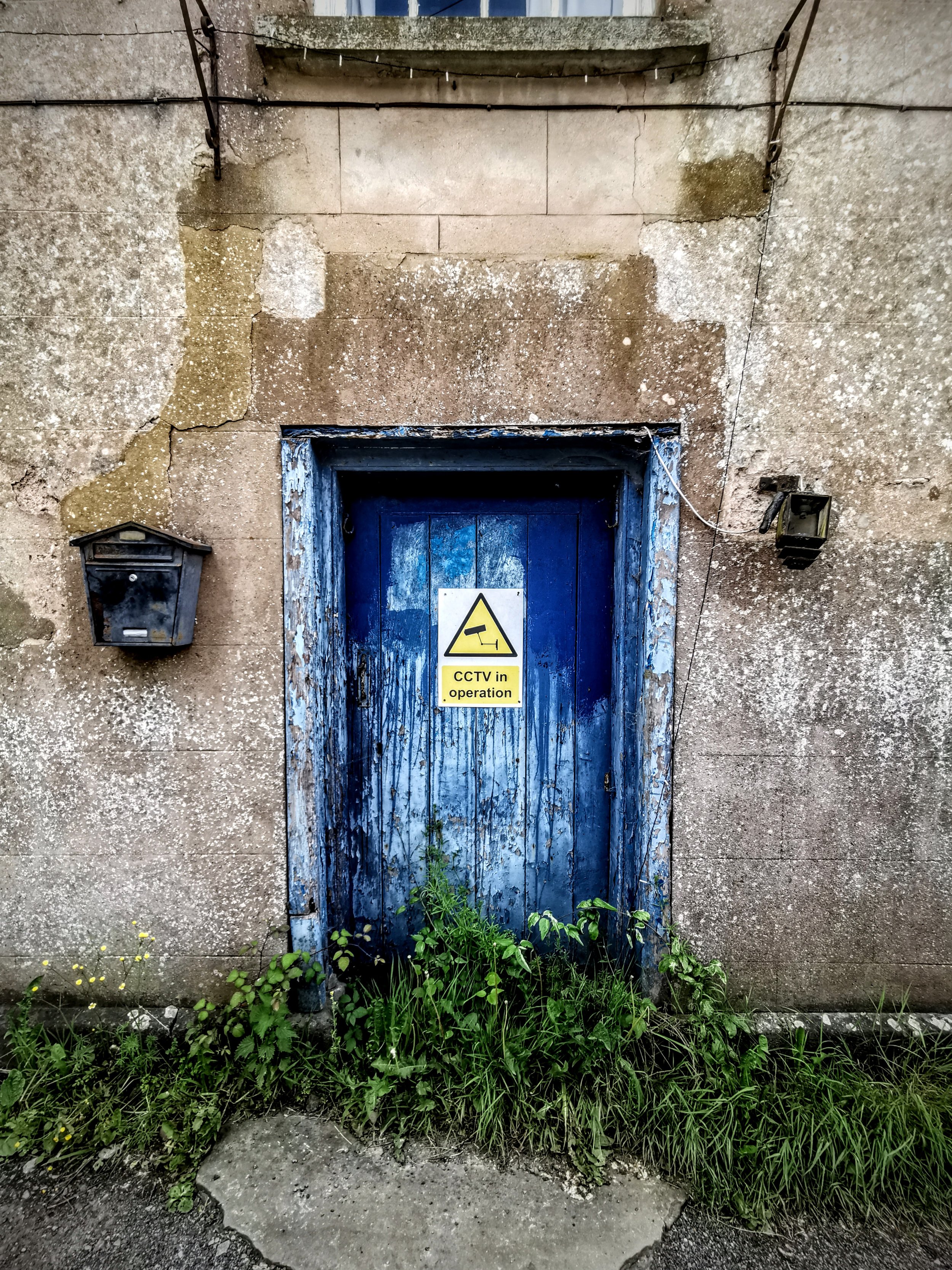 Door to an abandoned world. May Hill