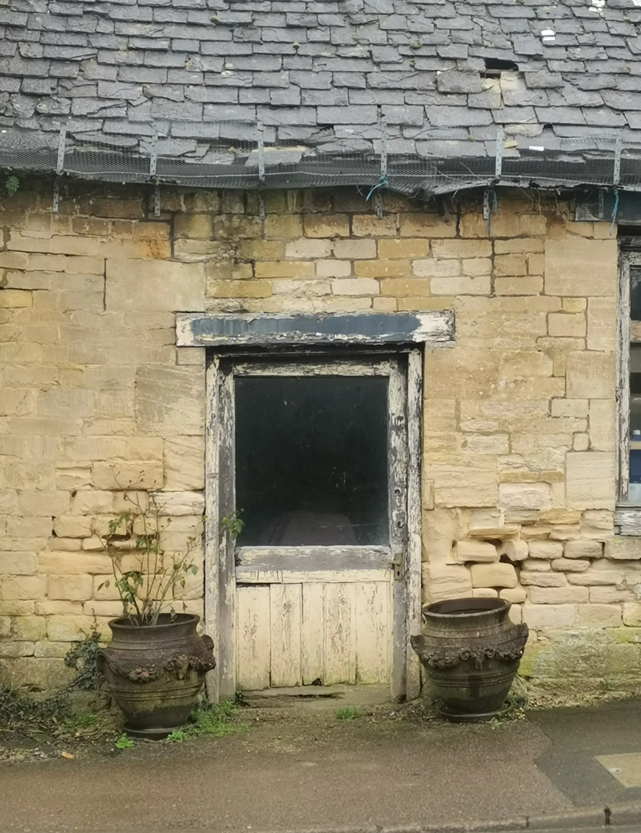 Neglected door in Northleach