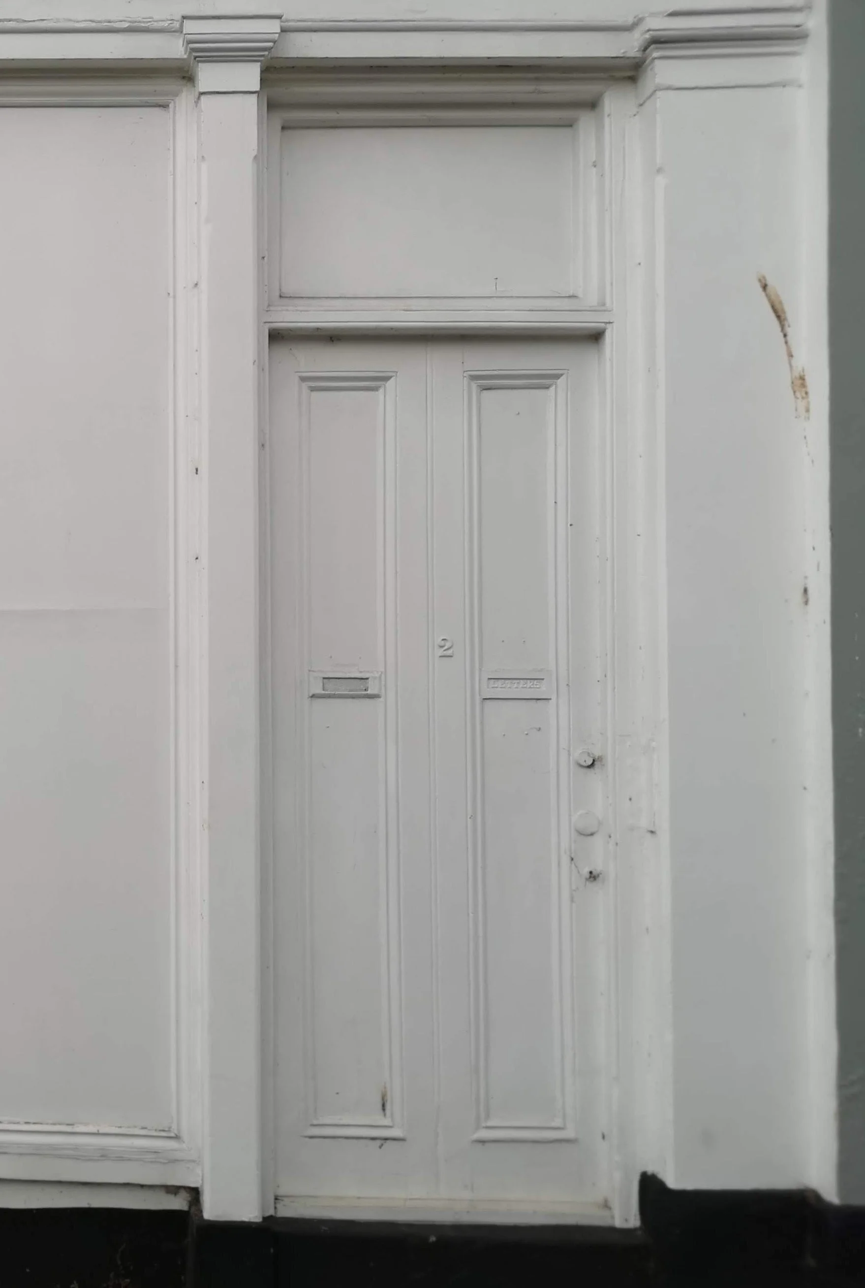 A really classic paint over, you can still even see the house number. Cheltenham
