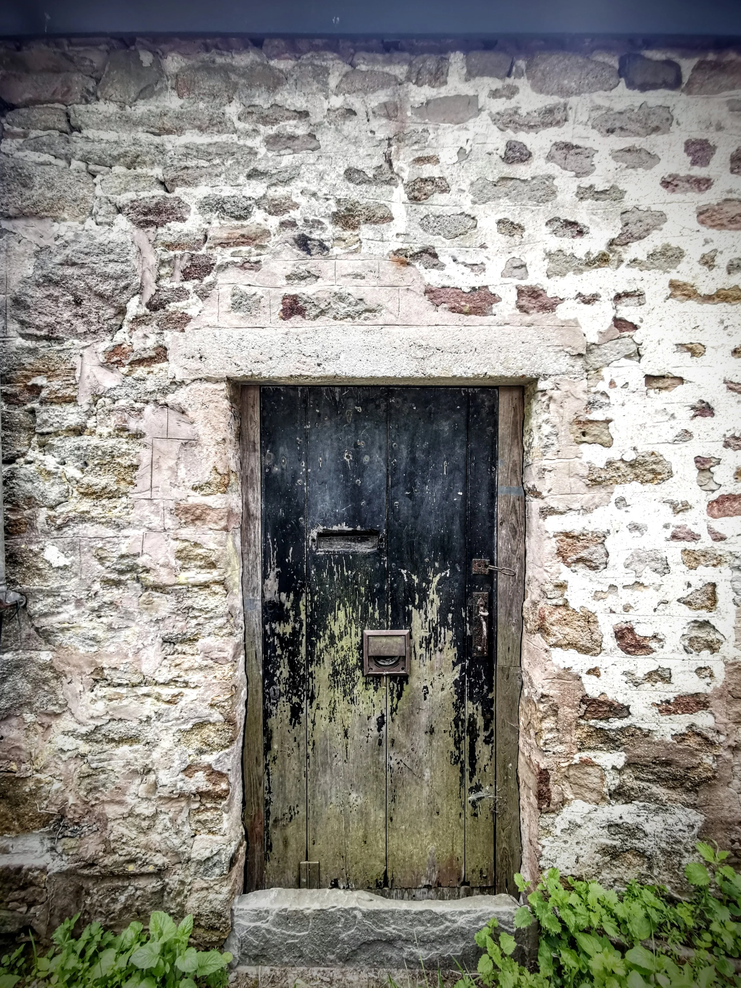 The faded grandeur of this door found near May Hill, Gloucestershire