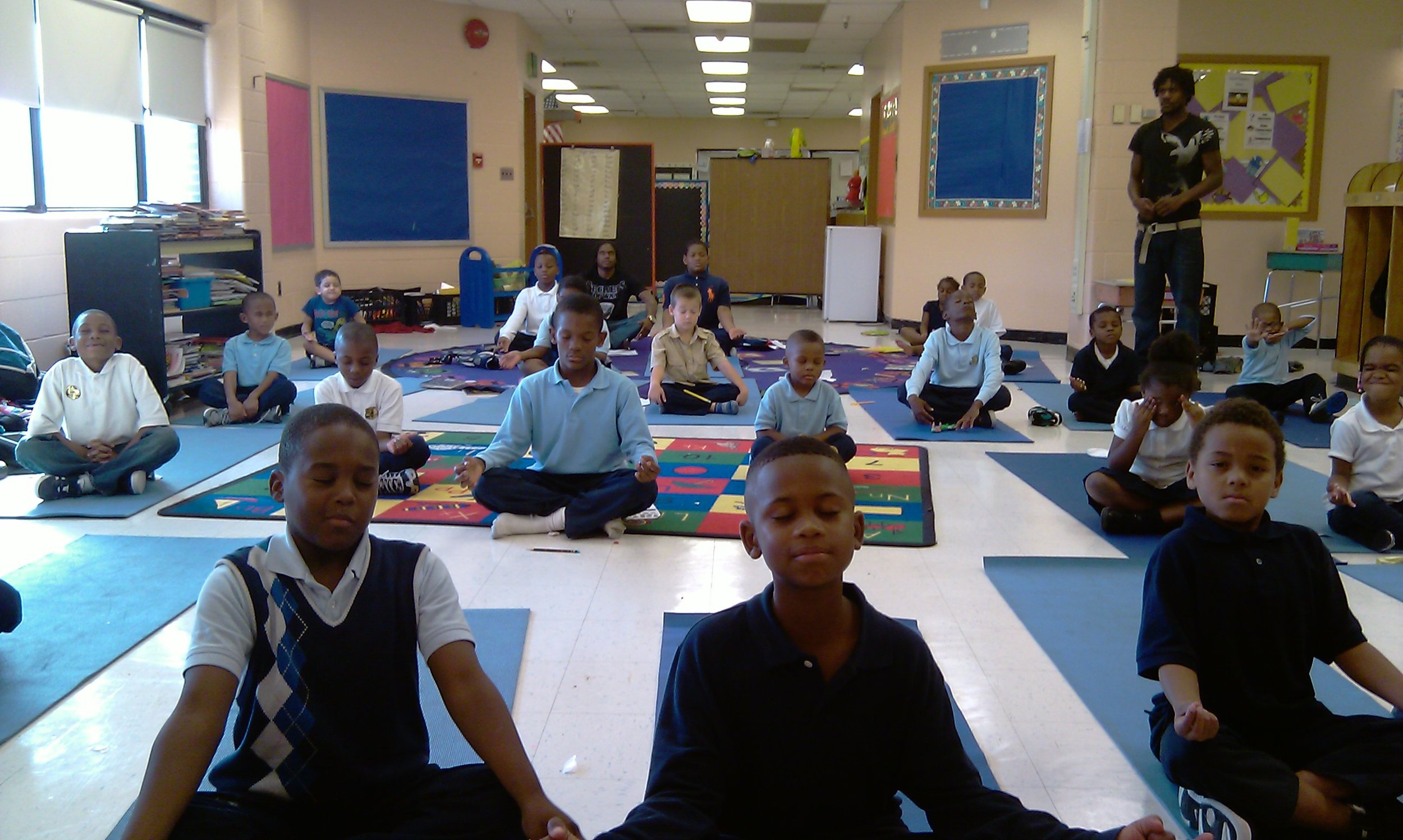 Students practicing pranayama at the after school program.jpg