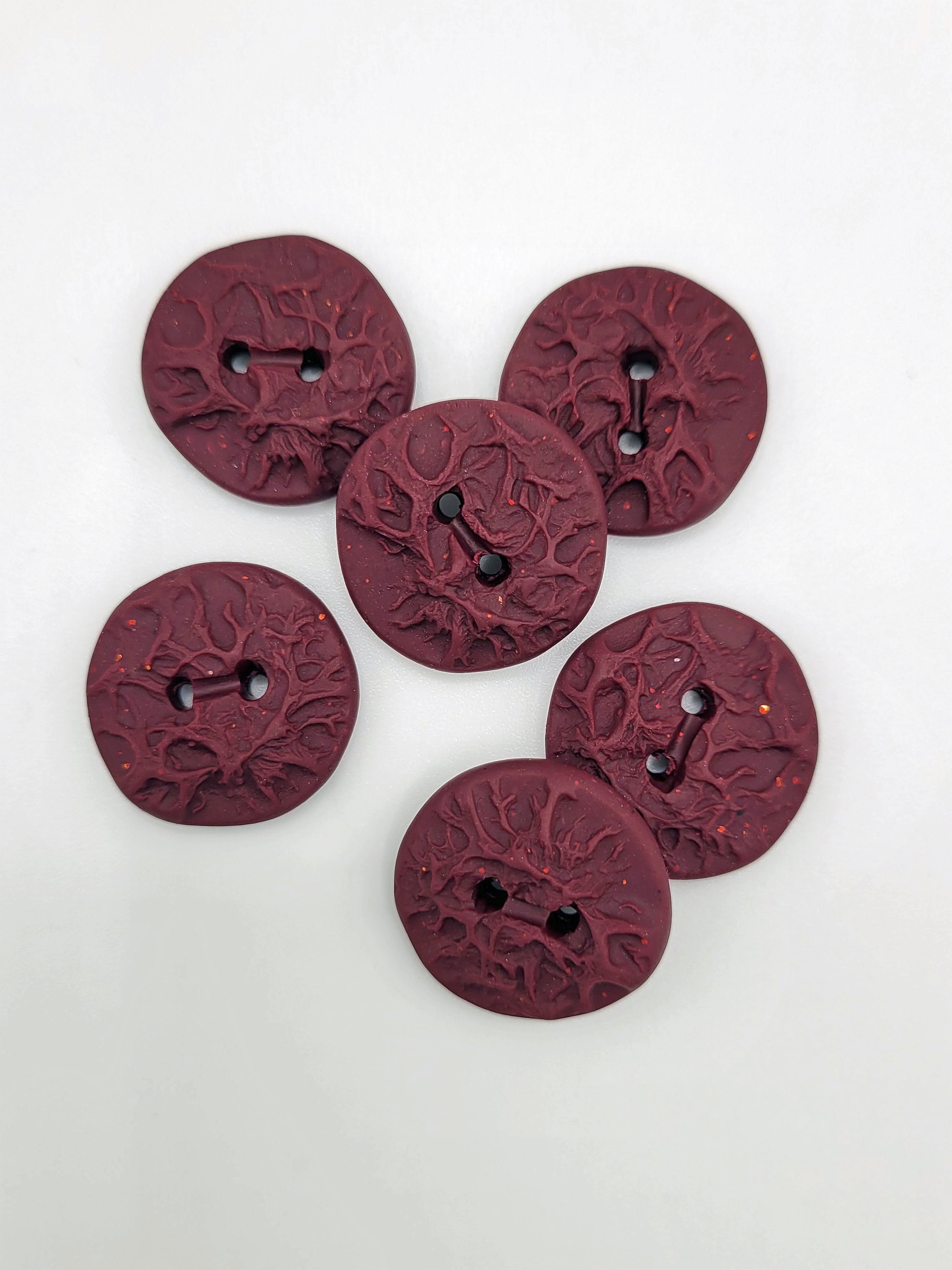 Speckled beetroot lichen buttons.jpg