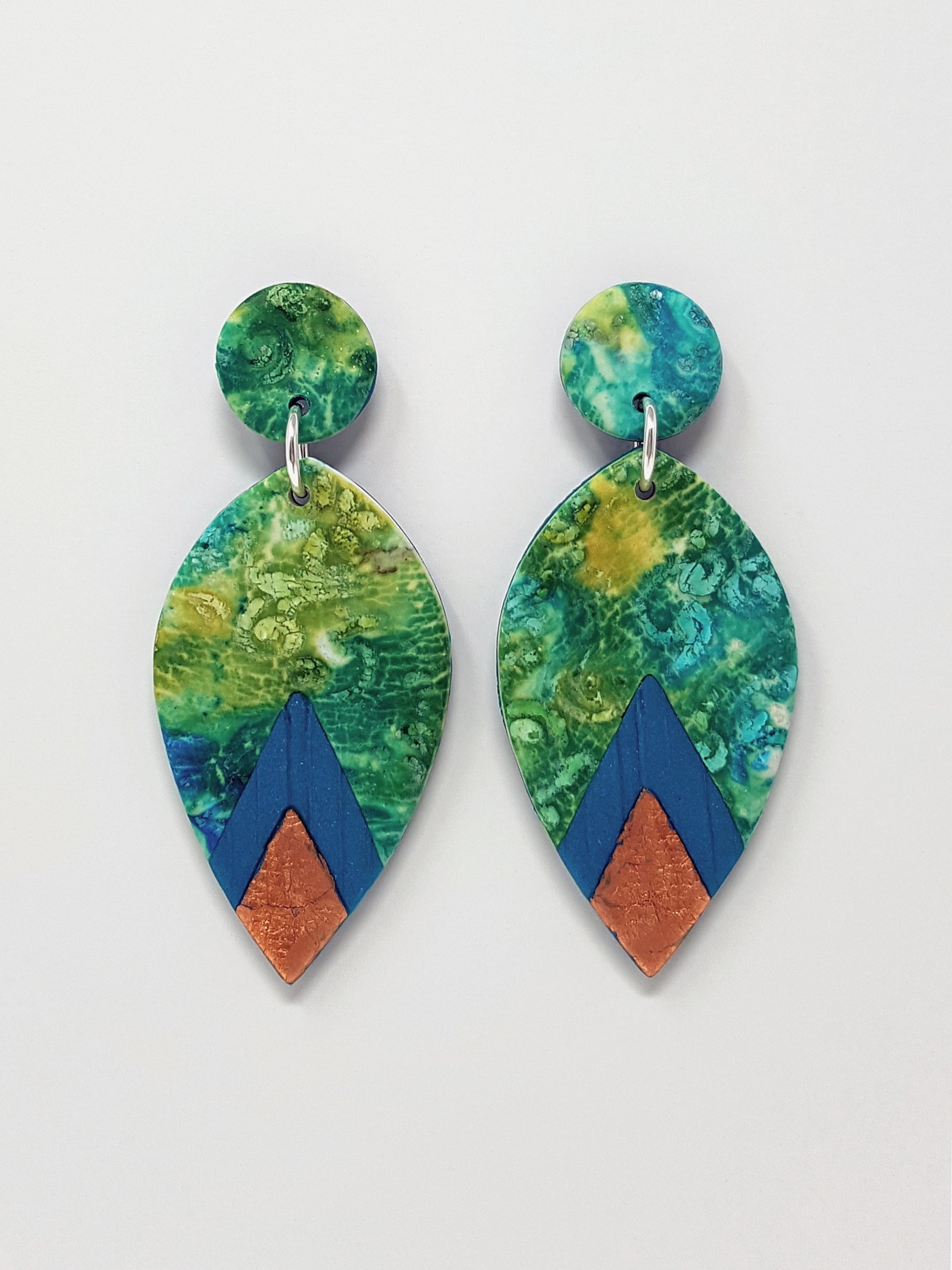 Peacock, green, turquoise long dangle earrings, round stud tops, faux bronze and peacock arrow shape accents at base of petal dangle bead.