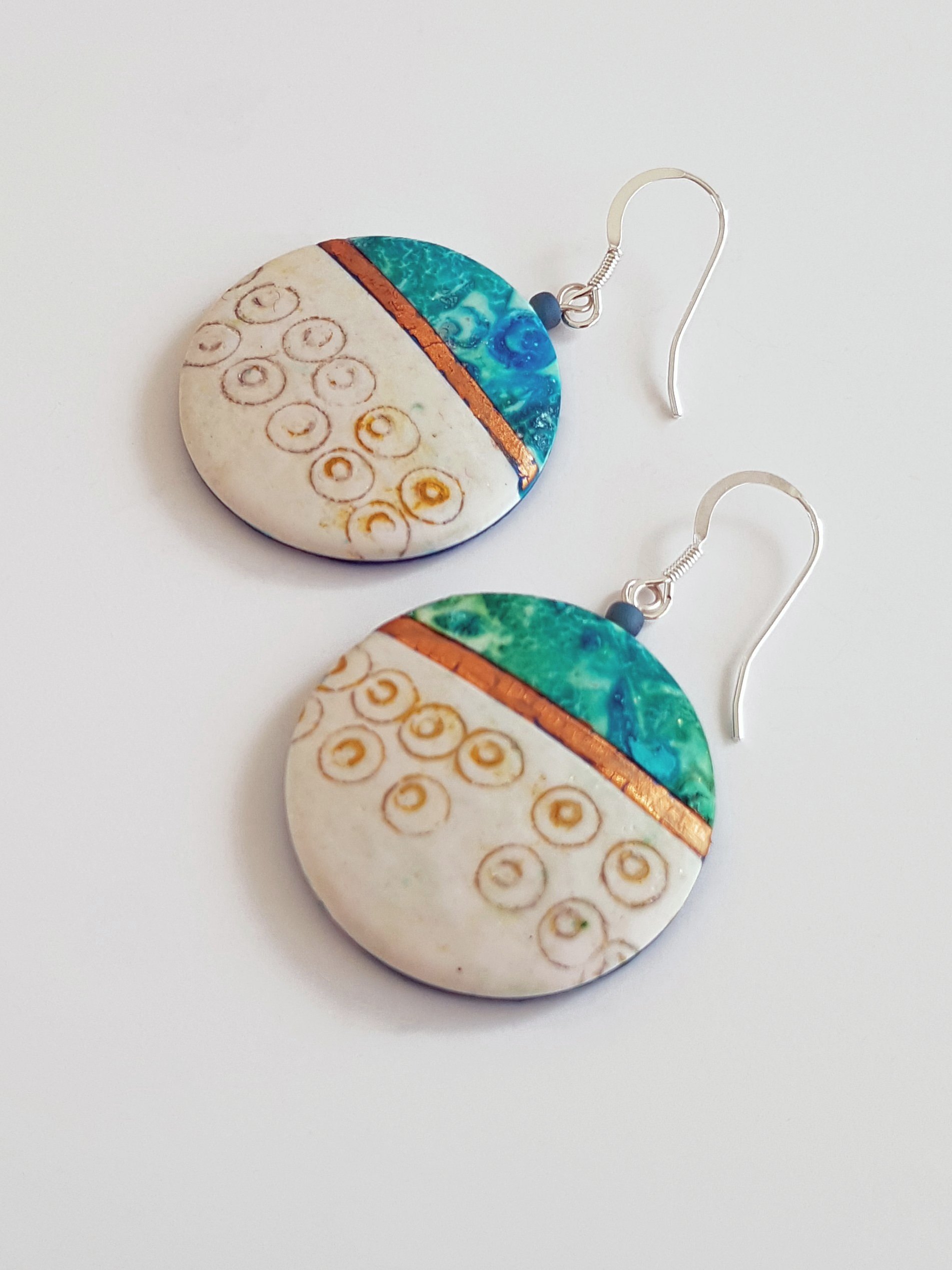 Large dangle beads, 31mm diameter, 50mm drop, in teal, turquoise, cream with bronze colour bands, sterling silver ear wires in boho style.