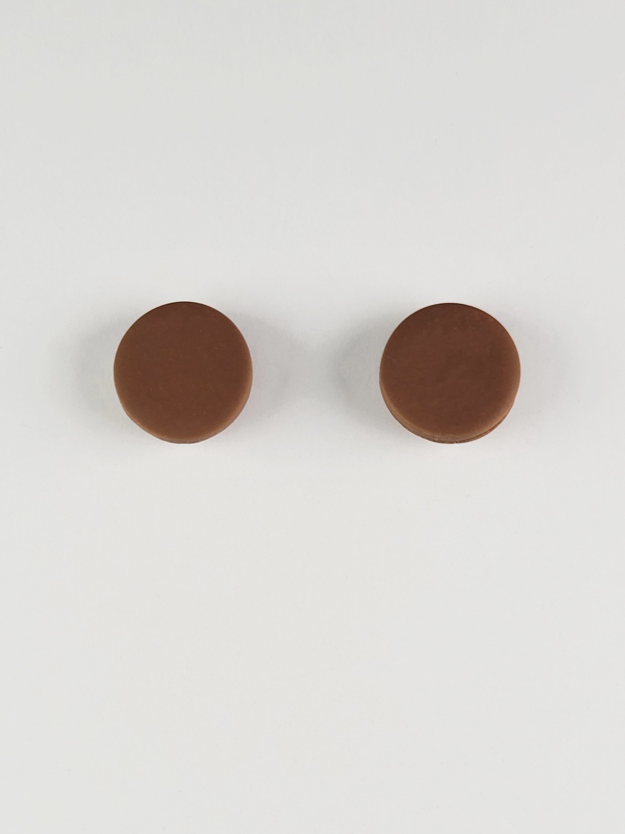 Nut brown round stud earrings made with polymer clay and sterling silver available in 6, 9, 13 or 16 mm diameters.